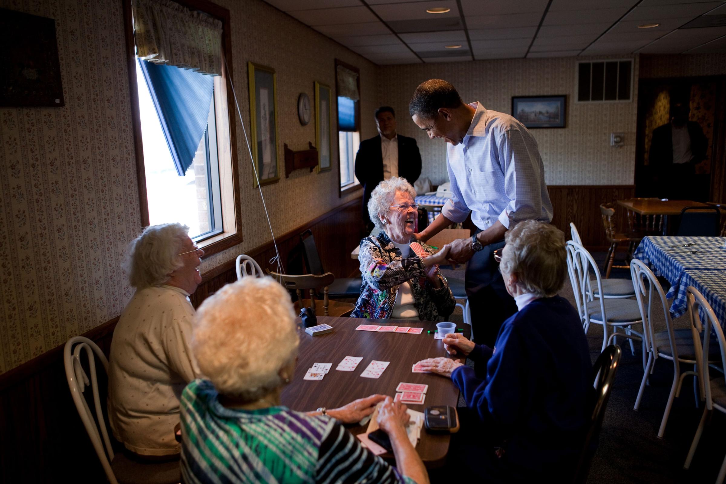 President Barack Obama visits with patrons at Jerry's Family Restaurant in Mount Pleasant, Iowa, April 27, 2010