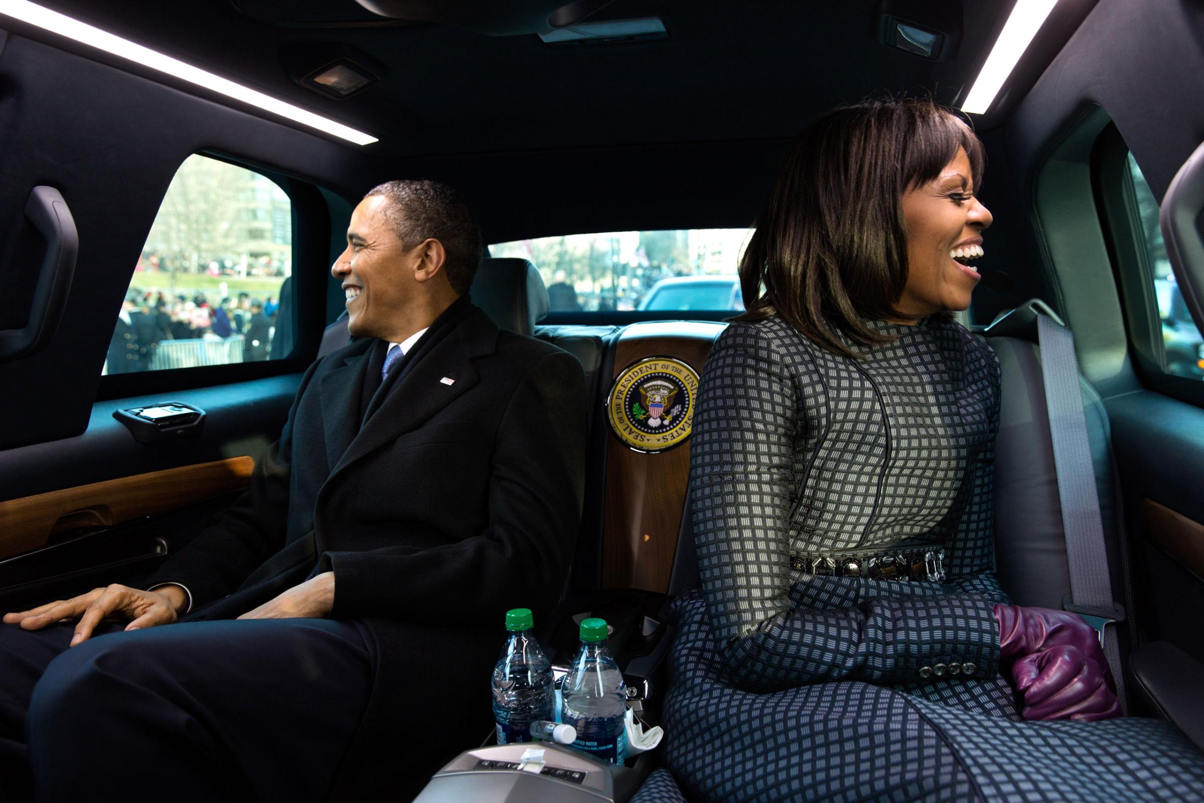 "The President and First Lady wave to supporters as they ride in the inaugural parade. I had asked the President if I could ride in the presidential limousine and the President joked, 'But Michelle and I were planning to make out," Jan.21, 2013.