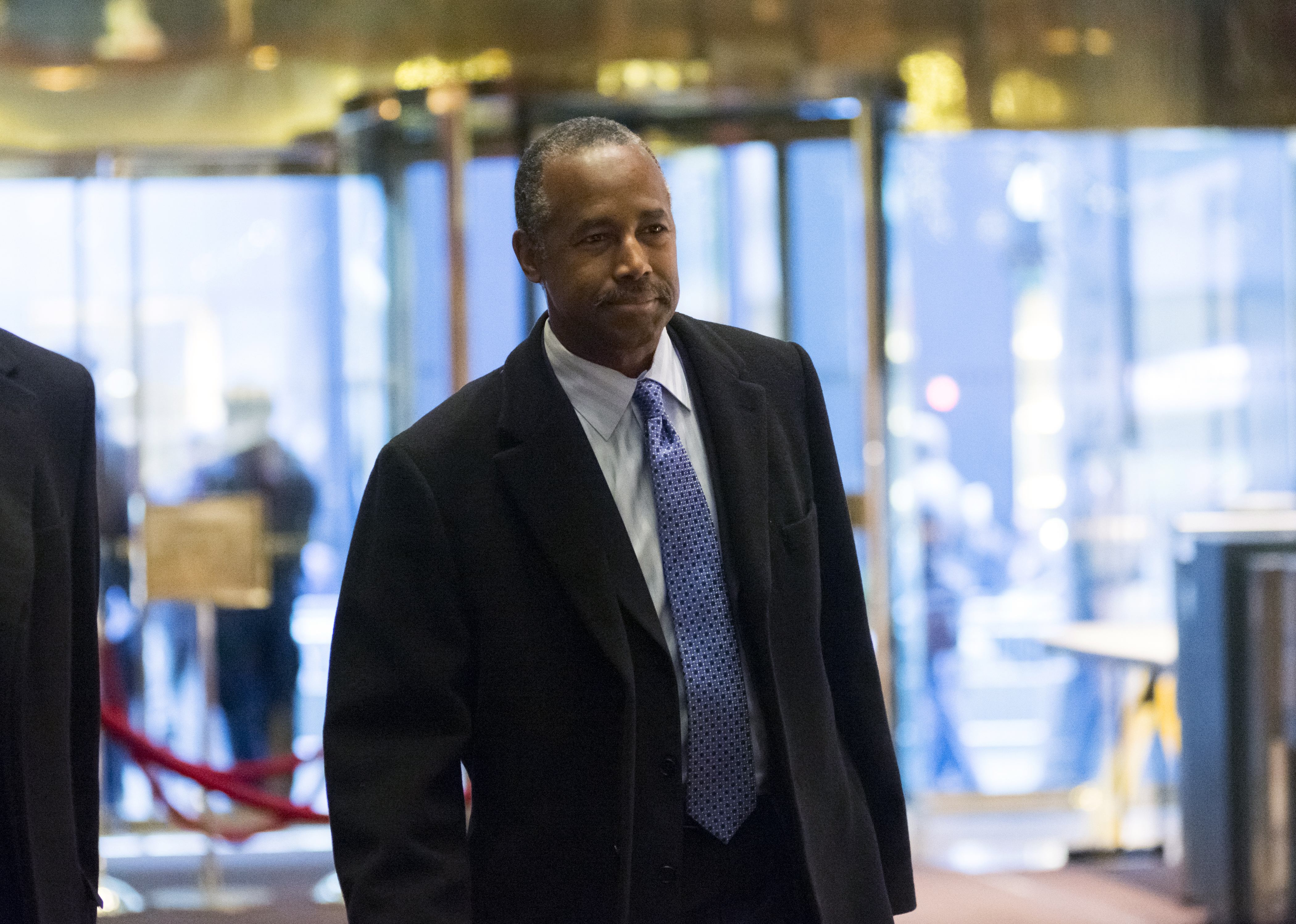 Ben Carson, secretary of U.S. Housing and Urban Development (HUD) nominee for President-elect Donald Trump, arrives in the lobby of Trump Tower in New York, U.S., on Monday, Dec. 12, 2016. (Albin Lohr-Jones/Bloomberg via Getty Images)