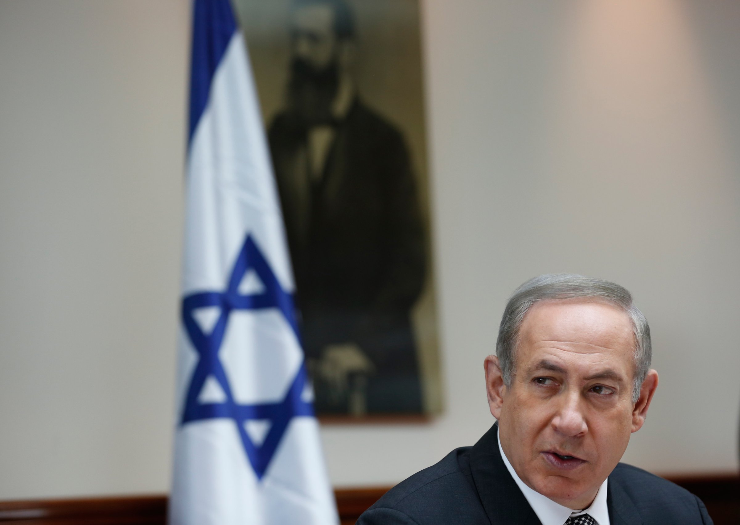 Israeli Prime Minister Benjamin Netanyahu attends the weekly cabinet meeting in Jerusalem, Sunday, Jan. 15, 2017. (Ronen Zvulun, pool via AP)