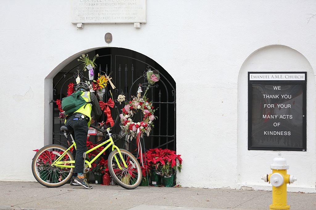A man stops to observe the makeshift memorial in front of Mother Emanuel AME Church in downtown Charleston, South Carolina on January 4, 2017. (LOGAN CYRUS—AFP/Getty Images)