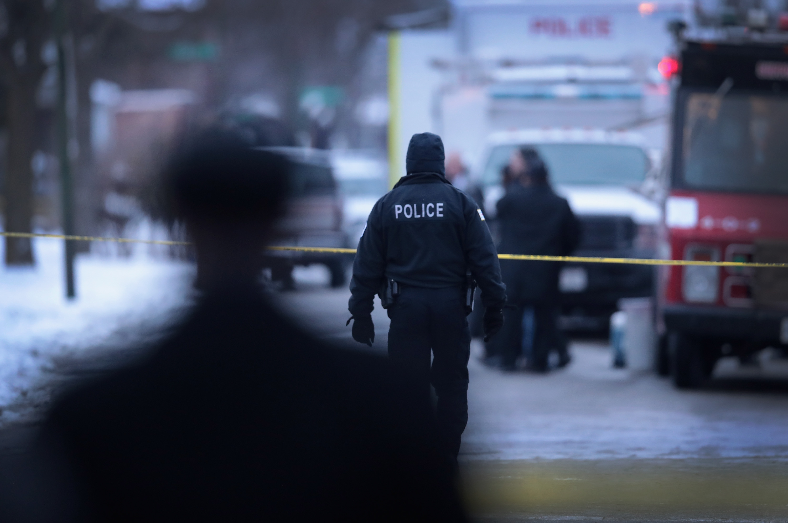 Chicago Police investigate the scene of a quadruple homicide on the city's Southside on Dec. 17, 2016. (Scott Olson—Getty Images)
