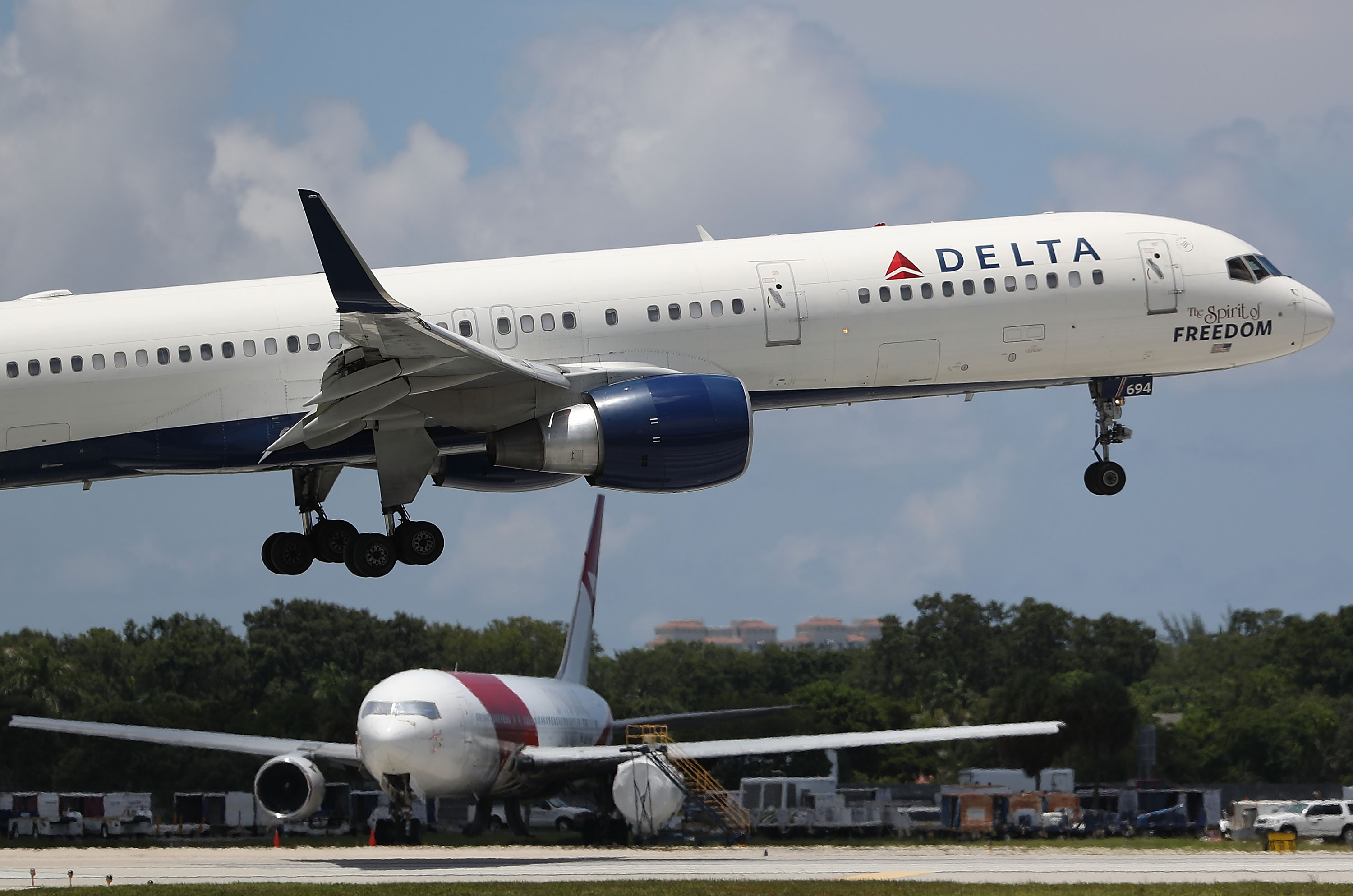 FORT LAUDERDALE, FL - JULY 14:  A Delta airlines plane is seen as it comes in for a landing at the Fort Lauderdale-Hollywood International Airport on July 14, 2016 in Fort Lauderdale, Florida. Delta Air Lines Inc. reported that their second quarter earnings rose a better-than-expected 4.1%, and also announced that they decided to reduce its United States to Britian capacity on its winter schedule because of foreign currency issues and the economic uncertainty from Brexit.  (Photo by Joe Raedle/Getty Images) (Joe Raedle—Getty Images)