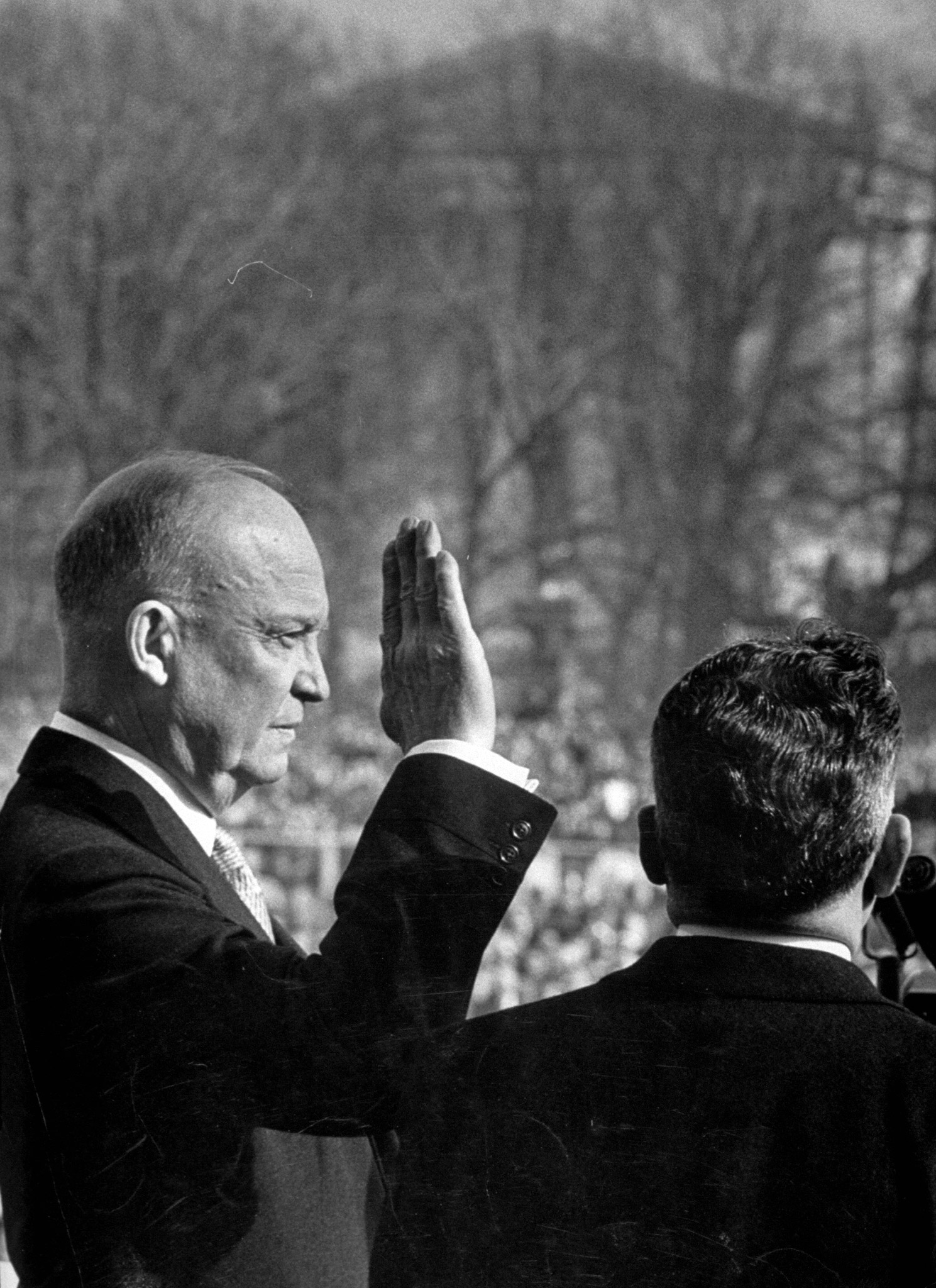 Dwight D. Eisenhower taking his first oath of office during inauguration, 1953.