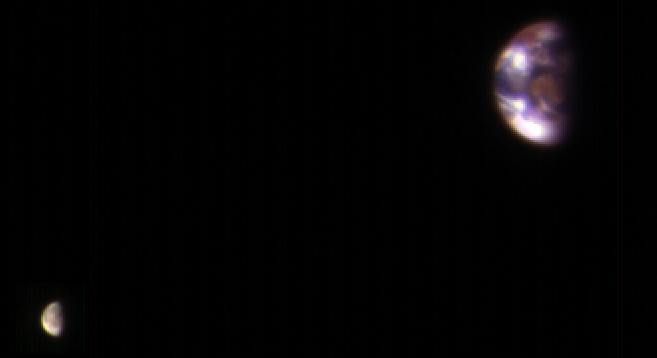 The Earth and the moon, as seen from Mars, via a composite image from four sets of images from the High Resolution Imaging Science Experiment (HiRISE) camera on NASA’s Mars Reconnaissance Orbiter, captured on Nov. 20, 2016. Each image was processed separately prior to combining to ensure the moon is visible, and retains the correct sizes and positions of both relative to each other. (NASA/JPL-Caltech/Univ. of Arizona)