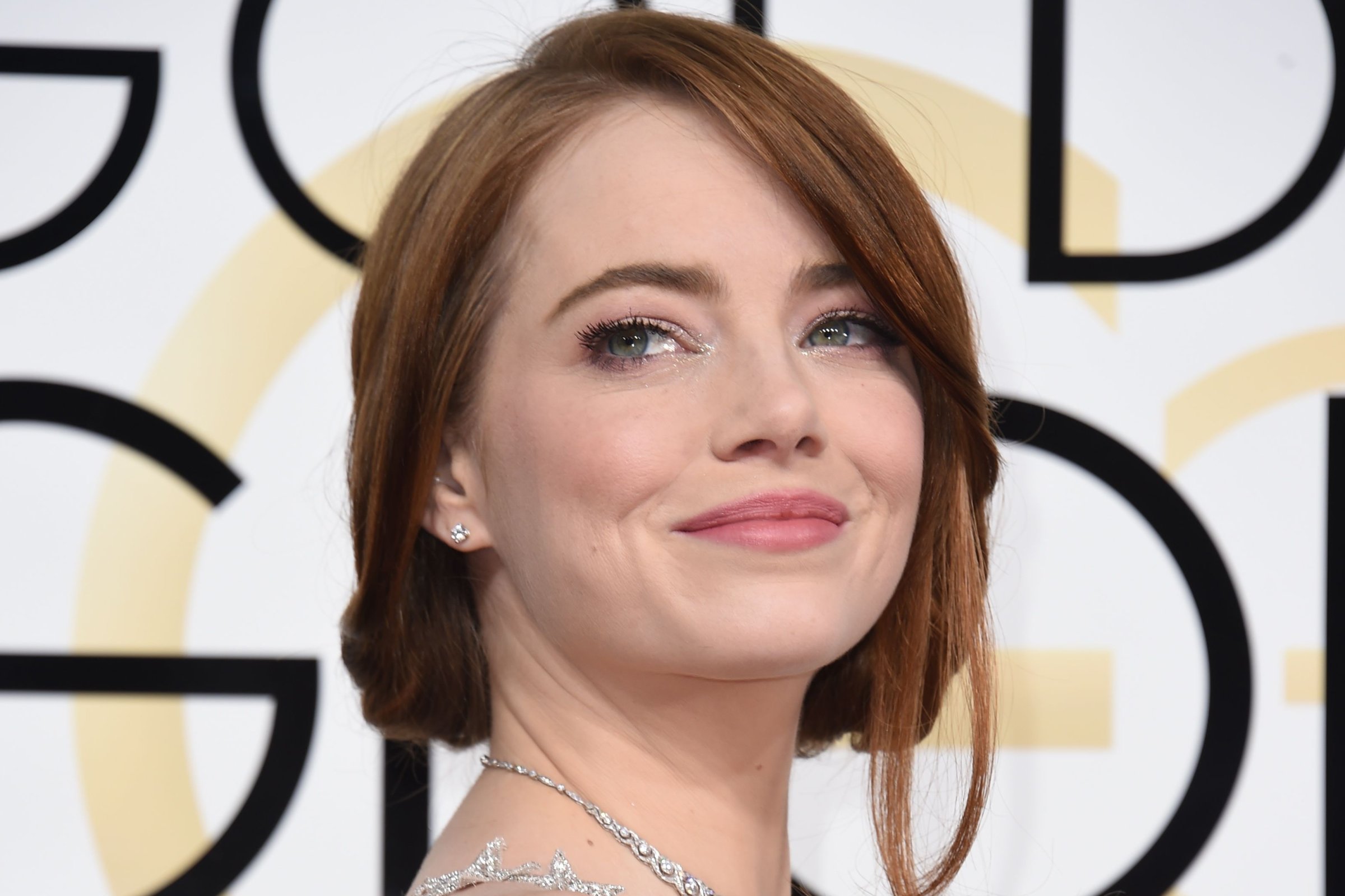 Emma Stone arrives at the 74th annual Golden Globe Awards, on Jan. 8, 2017 in Beverly Hills, Calif.