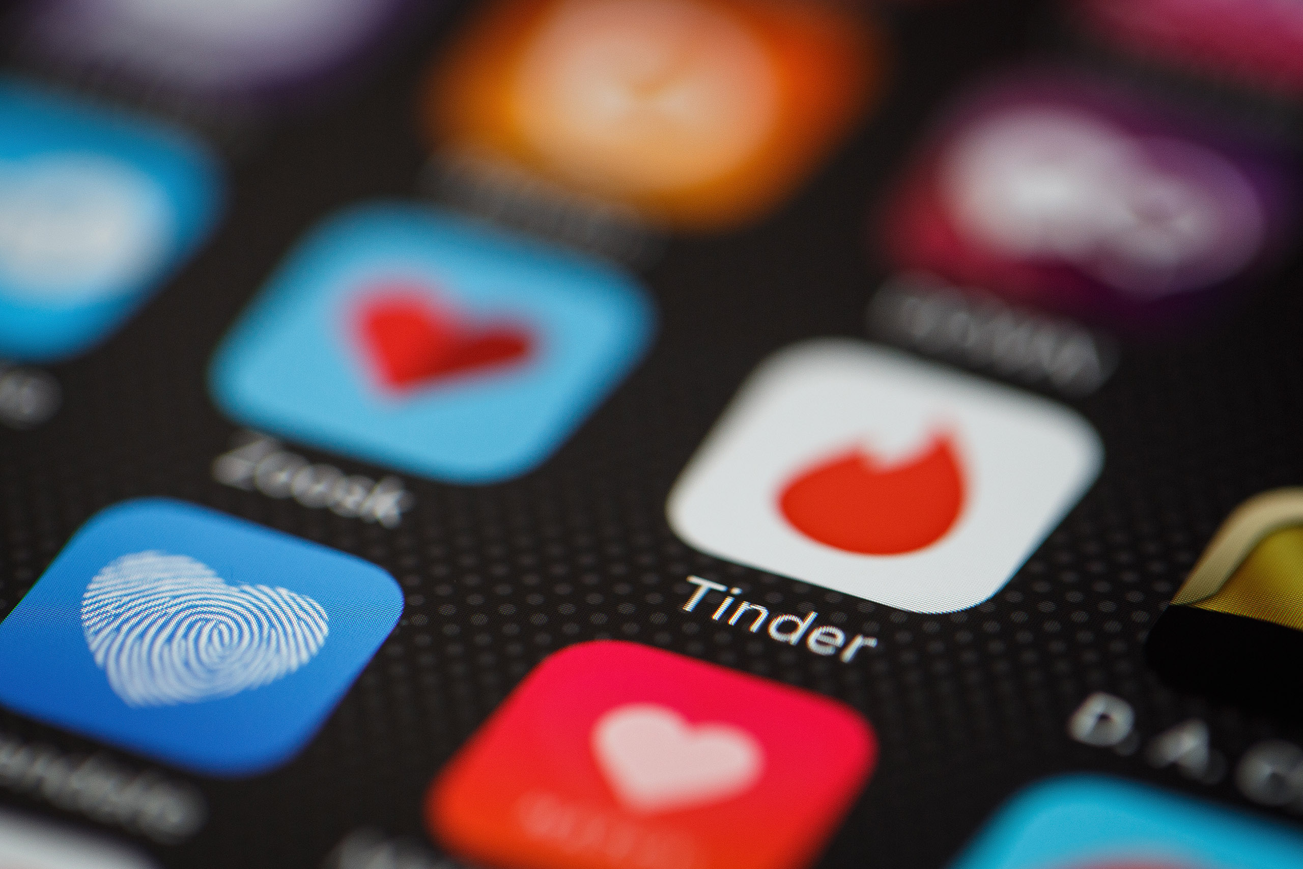 The "Tinder" app logo is seen amongst other dating apps on a mobile phone screen on Nov. 24, 2016. (Leon Neal—Getty Images)