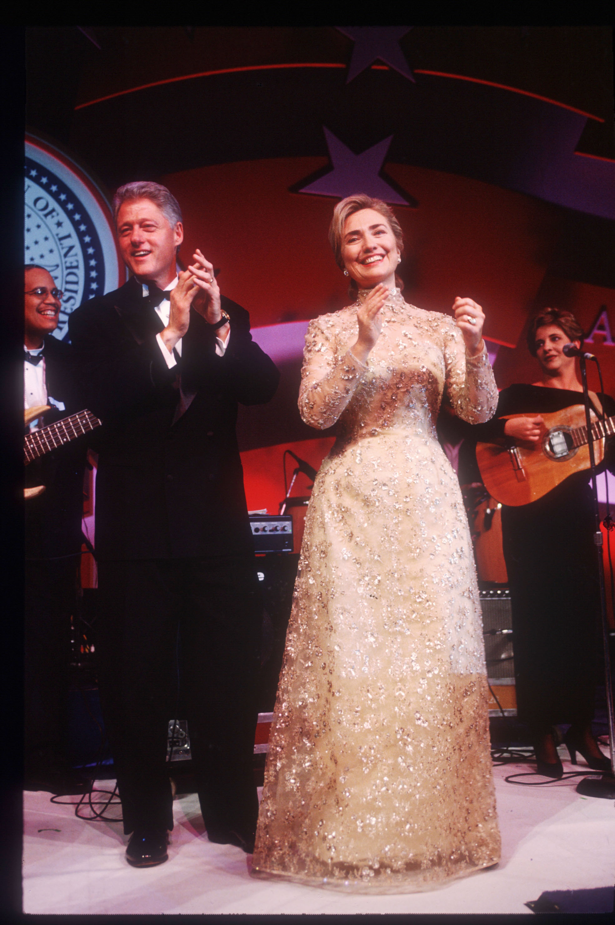 Hillary Clinton, Oscar de la Renta, 1997: Clinton wore this gold lace dress in 1997, but she first met the designer at the Kennedy Center in Dec. 1993, when he pointed out that she was wearing one of his dresses, which she claims she did not realize at the time. De la Renta has described his "friend" Hillary as "a symbol of where women want to go."