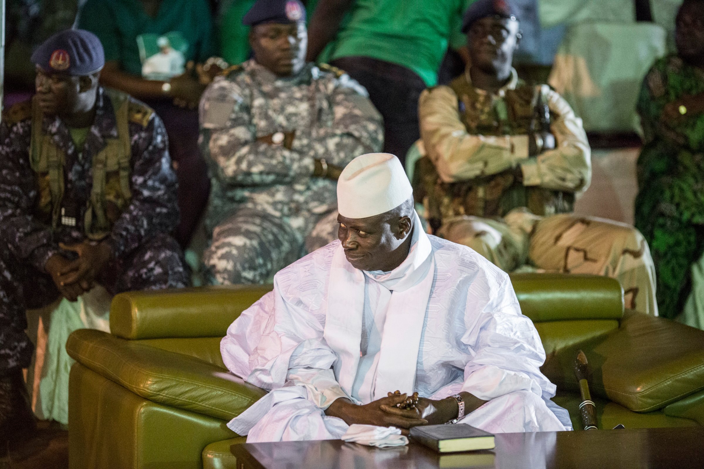 Incumbent Gambian President Yahya Jammeh looks on in Banjul on November 29, 2016, during the closing rally of the electoral campaign of the Alliance for Patriotic Reorientation and Construction (APRC).