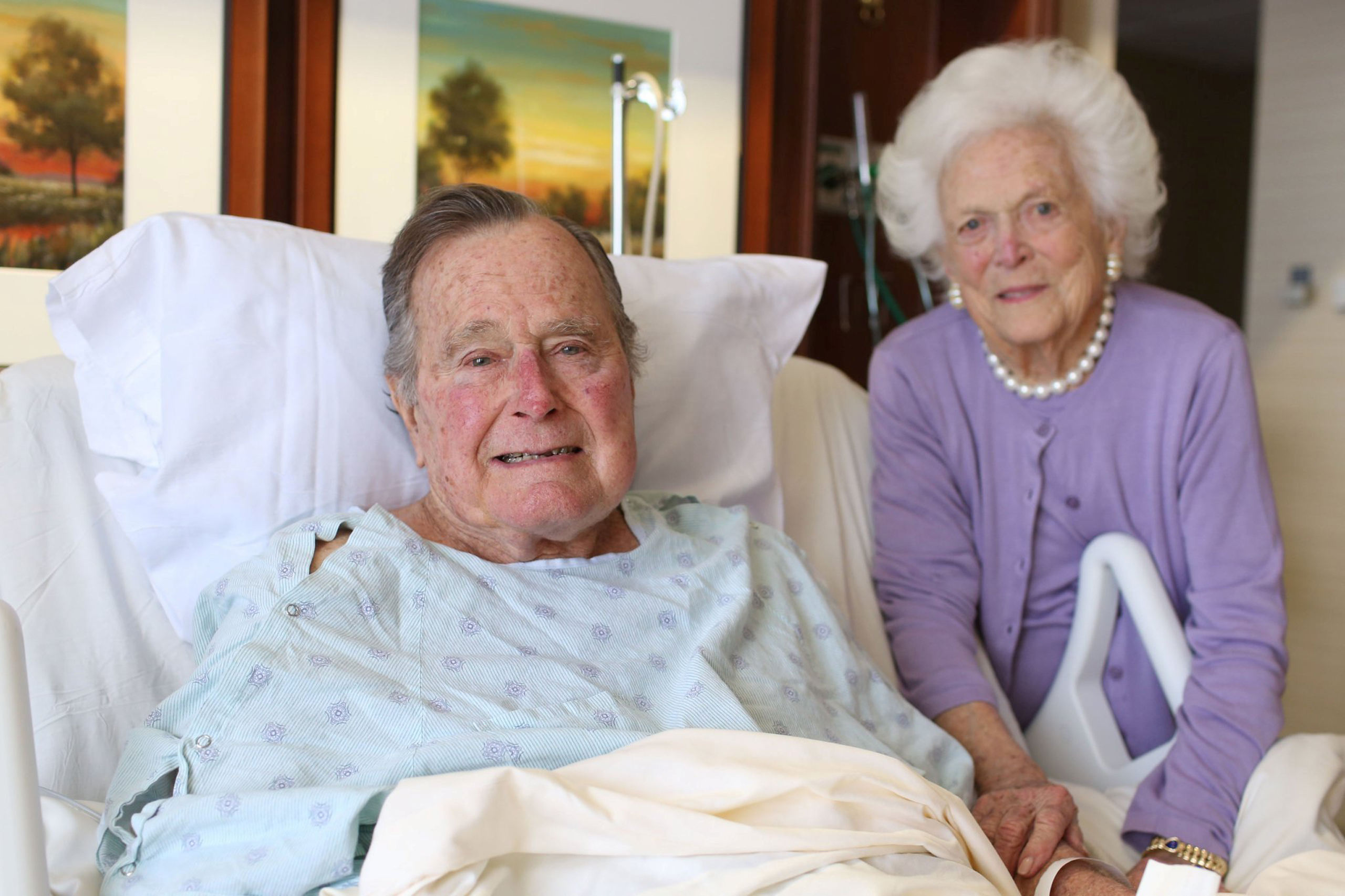 Former President George H.W. Bush and his wife Barbara Bush are pictured in Houston Methodist Hospital in Houston in this handout photo