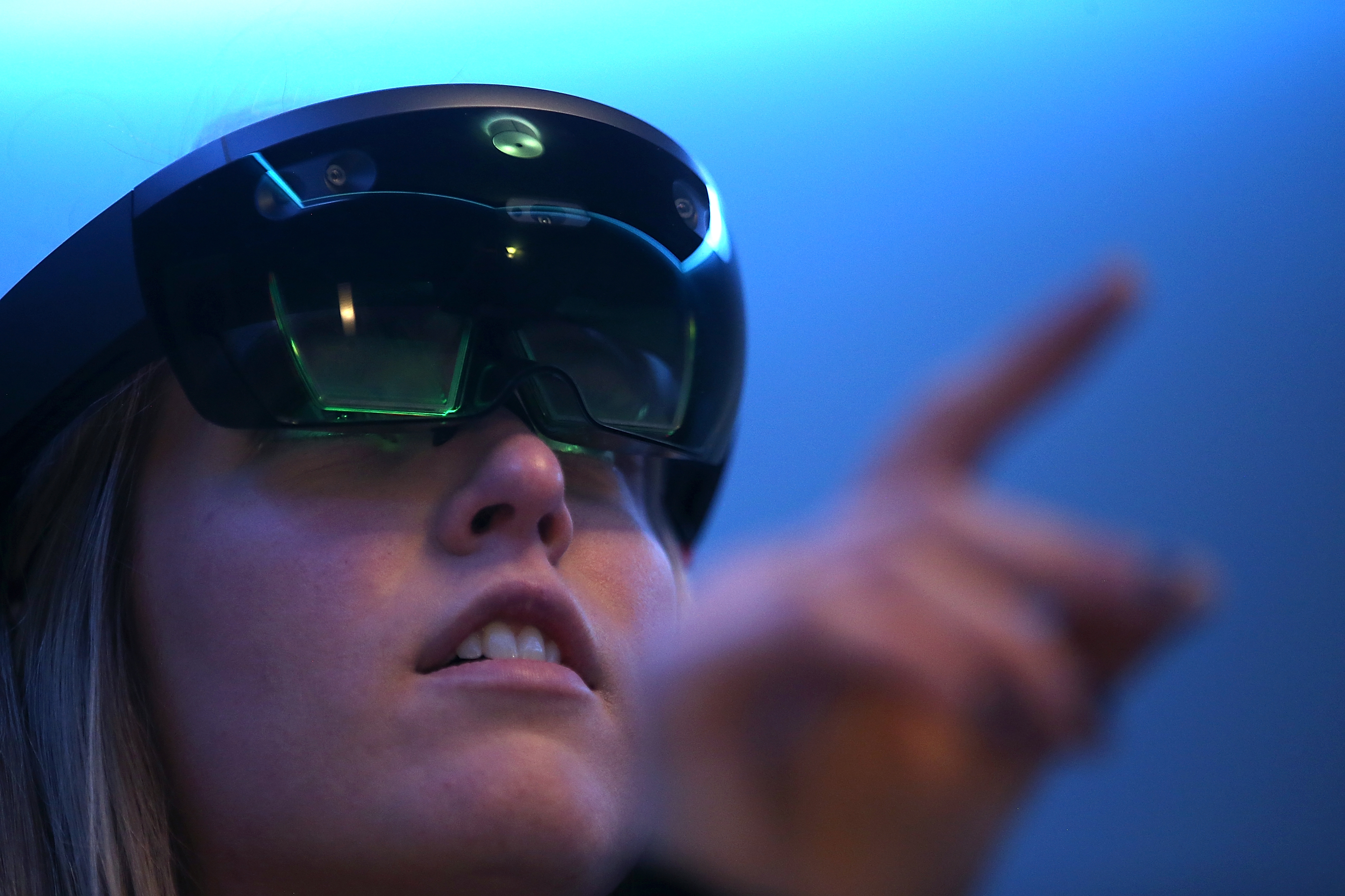 Microsoft employee Gillian Pennington demonstrates the Microsoft HoloLens augmented reality (AR) viewer during the 2016 Microsoft Build Developer Conference on March 30, 2016 in San Francisco, California. (Justin Sullivan&mdash;Getty Images)