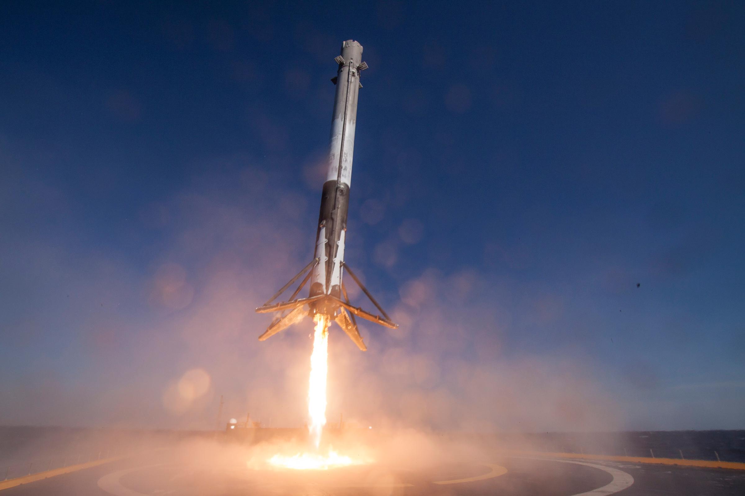 In this handout provided by the National Aeronautics and Space Administration (NASA), SpaceX's Falcon 9 rocket makes its first successful upright landing on the "Of Course I Still Love You" droneship on April 8, 2016 some 200 miles off shore in the Atlantic Ocean after launching from Cape Canaveral, Florida.