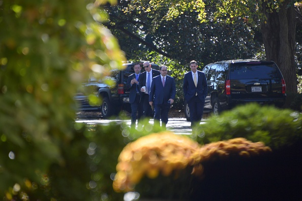 Trump aide Dan Scavino (left) and other members of President-elect Donald Trump's staff arrive at the White House as Trump attends a transition planning meeting with US President Barack Obama on November 10, 2016 in Washington, D.C. (JIM WATSON—AFP/Getty Images)