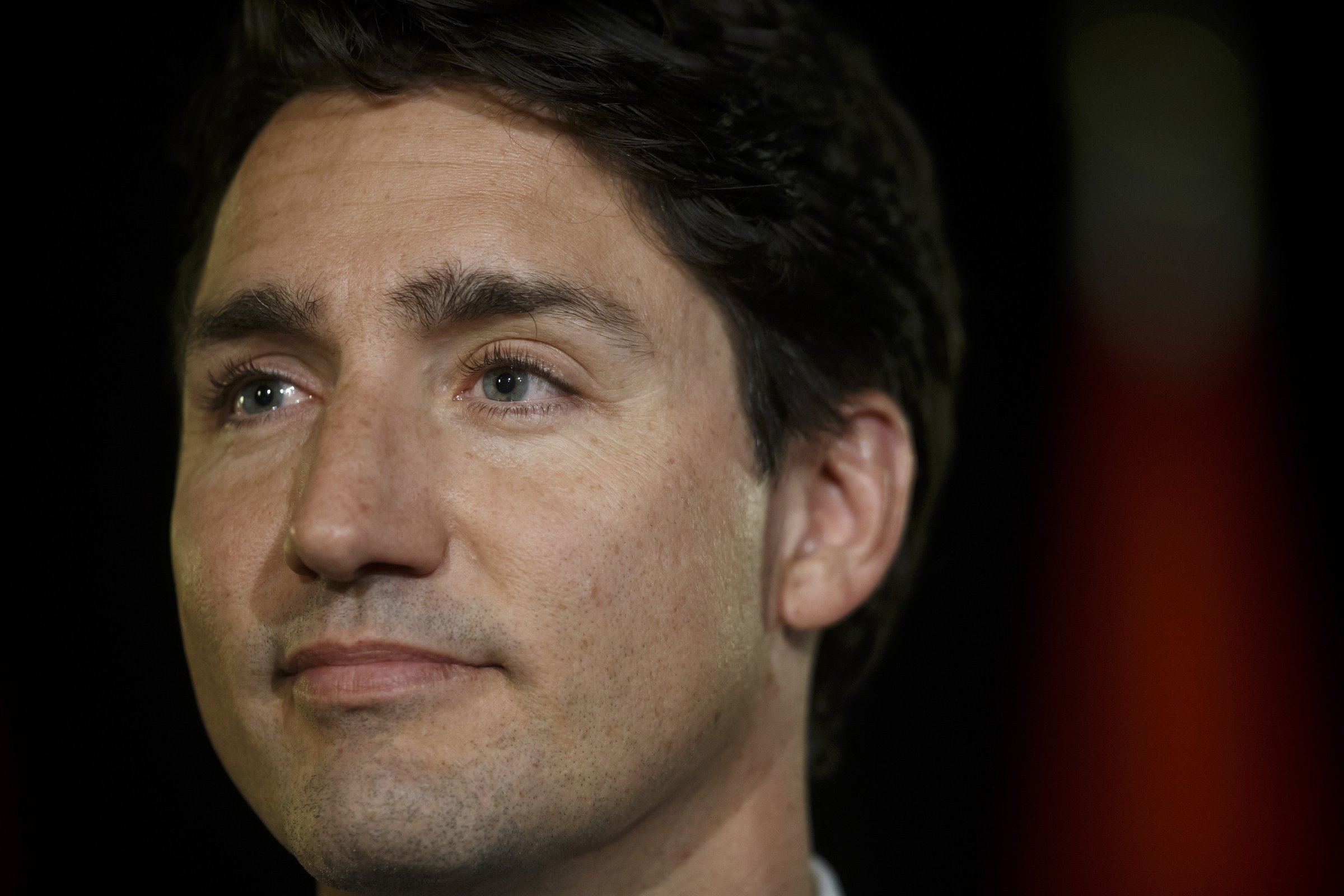 Justin Trudeau, Canada's prime minister, listens during a news conference following a town hall event in Kingston, Ontario, Canada, on Jan. 12, 2017.