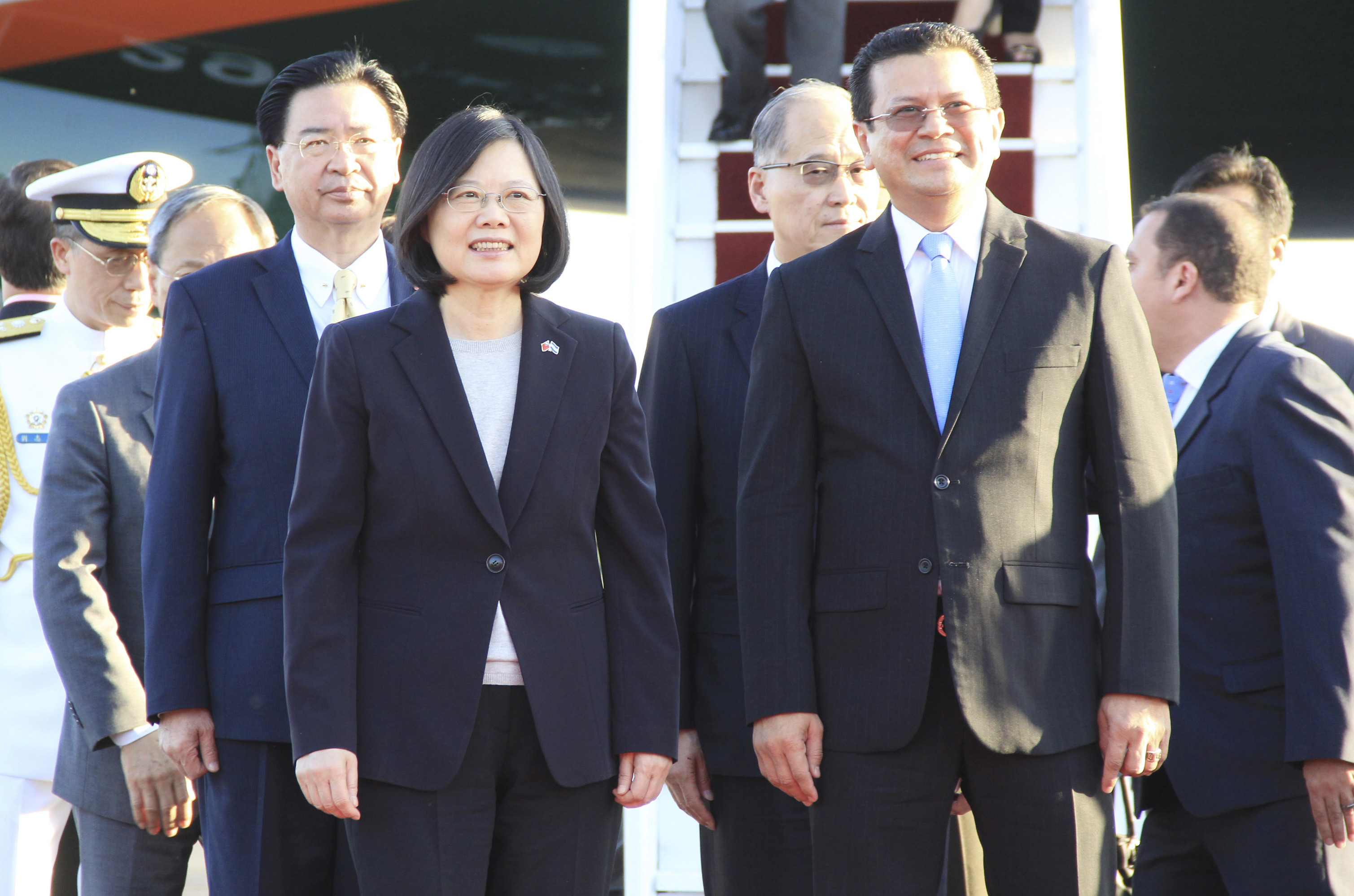 In this handout photo provided by the Salvadorian Chancery, Tsai Ing-wen, President of Taiwan, left, and the Chancellor of the Republic of El Salvador, Hugo Martínez, look on during her arrival at the Óscar Arnulfo Romero International Airport on Jan. 12, 2017, in La Paz, El Salvador (Mario Pascassio/Chancery/Getty Images Latam)