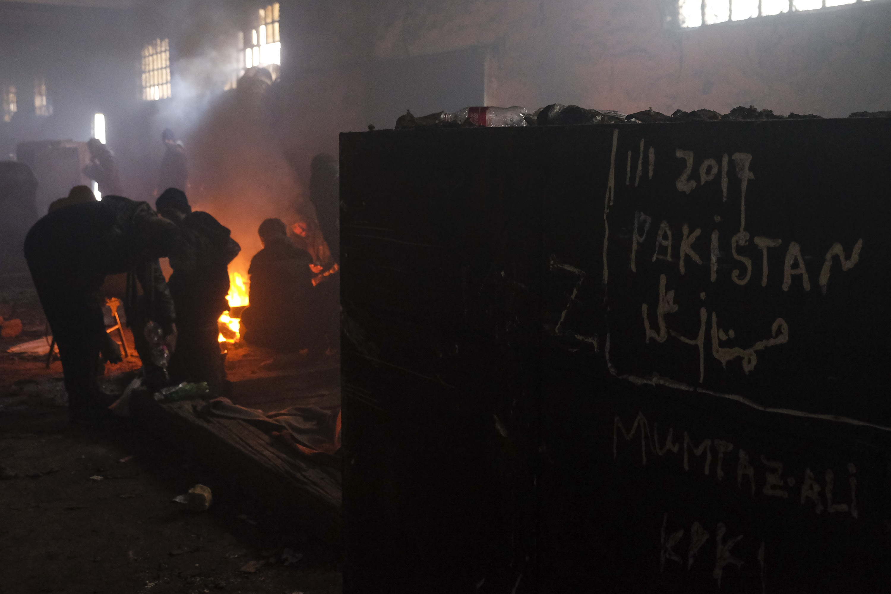 More than 1500 people are living in bleak conditions in one of the warehouses near the train station, Jan. 17, 2017 in Belgrade, Serbia. (Awakening—Barcroft Media/Getty Images)