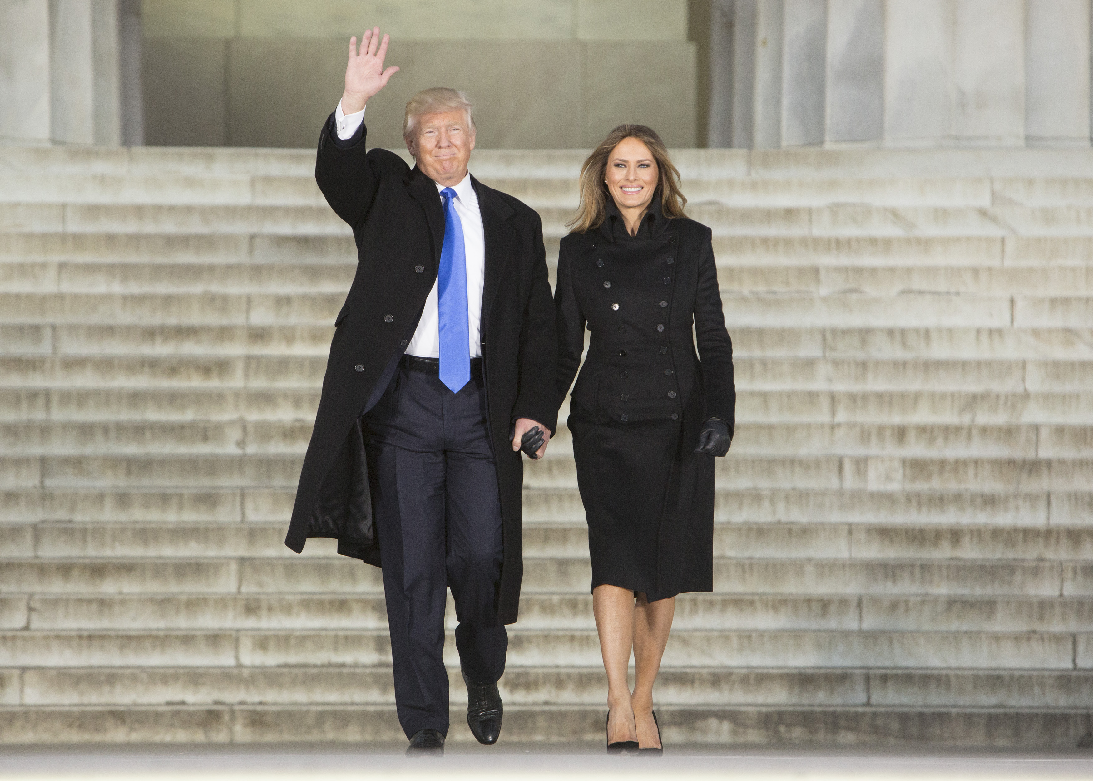 Donald Trump and Melania Trump arrive at the "Make America Great Again Welcome Celebration" concert at the Lincoln Memorial in Washington, D.C. on Jan. 19, 2017. (Chris Kleponis—Getty Images)
