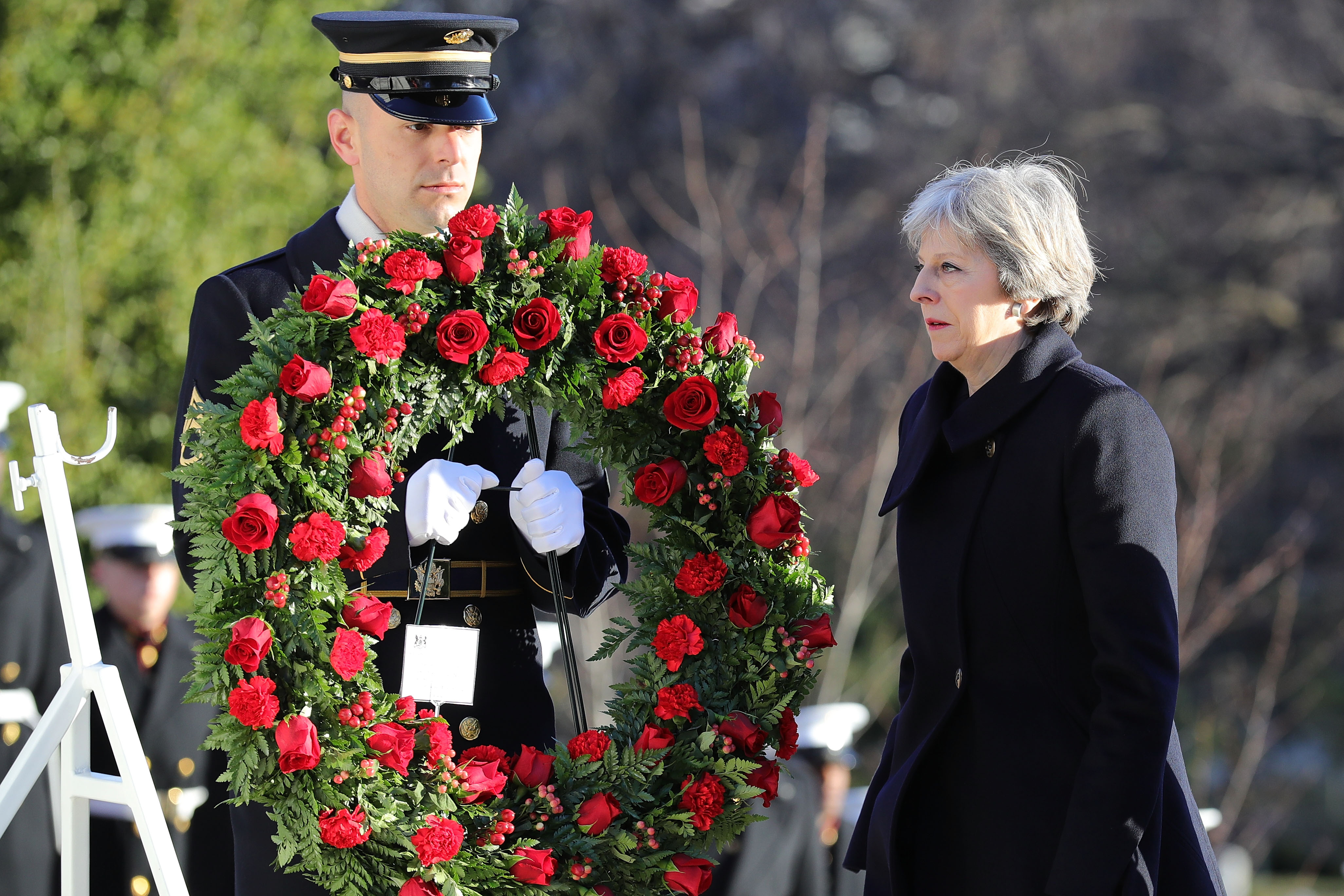 British Prime Minister Theresa May lays a wreath at the Tomb of the Unknown Solider in Arlington National Cemetery on January 27, 2017 in Arlington, Virginia. (Christopher Furlong—Getty Images)
