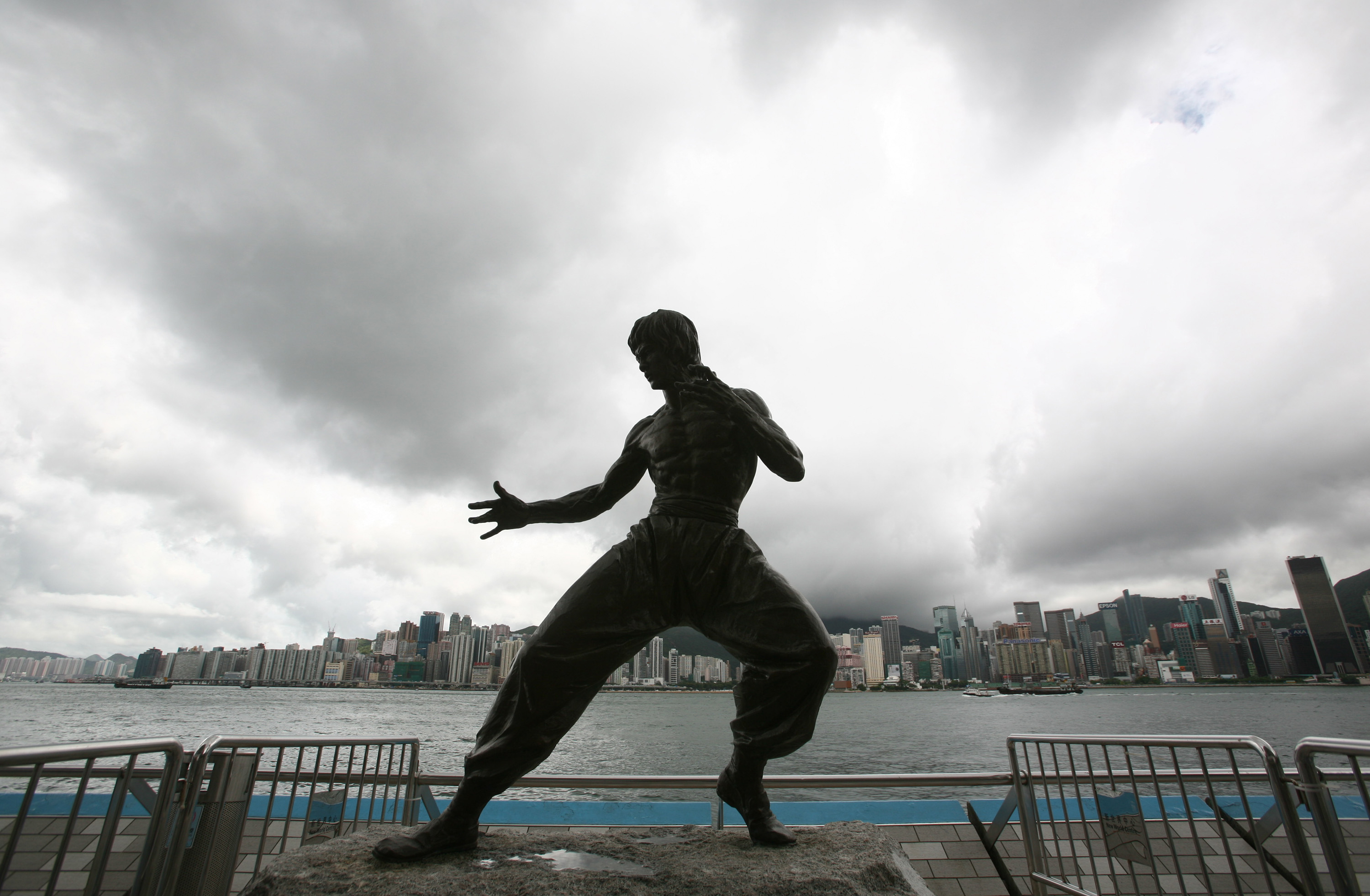 The bronze statue of late martial-arts legend and actor Bruce Lee stands on the Avenue of Stars in Hong Kong, on June 29, 2007. (China Photos/Getty Images)