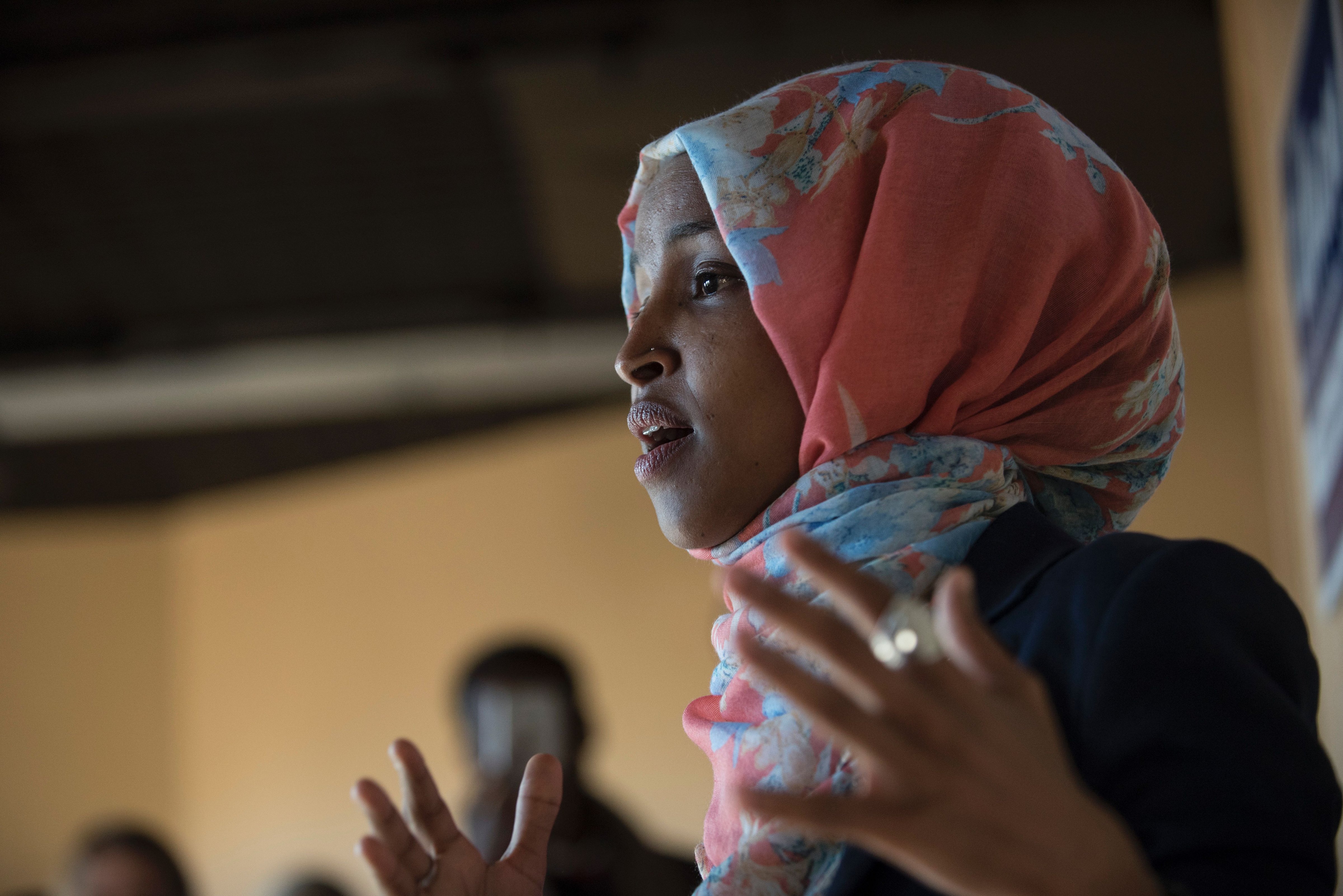 Ilhan Omar, candidate for State Representative for District 60B in Minnesota, speaks to a group of volunteers on Election Day, November 8, 2016 in Minneapolis, Minnesota.
                      Omar, a refugee from Somalia, would be the first Somali-American Muslim woman if elected. / AFP / STEPHEN MATUREN        (Photo credit should read STEPHEN MATUREN/AFP/Getty Images) (STEPHEN MATUREN—AFP/Getty Images)