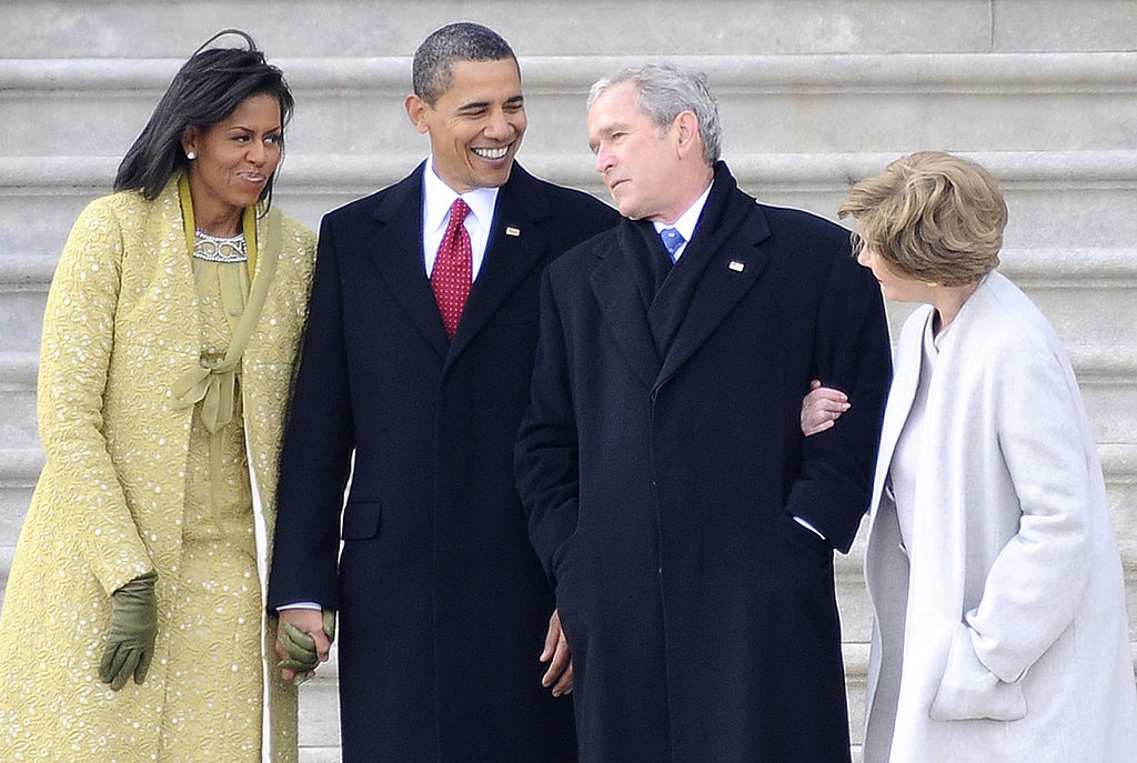 Former President George W. Bush (2-R), his wife Laura (R) stand with President Barack Obama (2-L) and First Lady Michelle Obama (L) as Bush departs from the U.S. Capitol after the inauguration of Barack Obama as the 44th president of the U.S. on Jan. 20, 2009 in Washington, DC. (Pool&mdash;Getty Images)