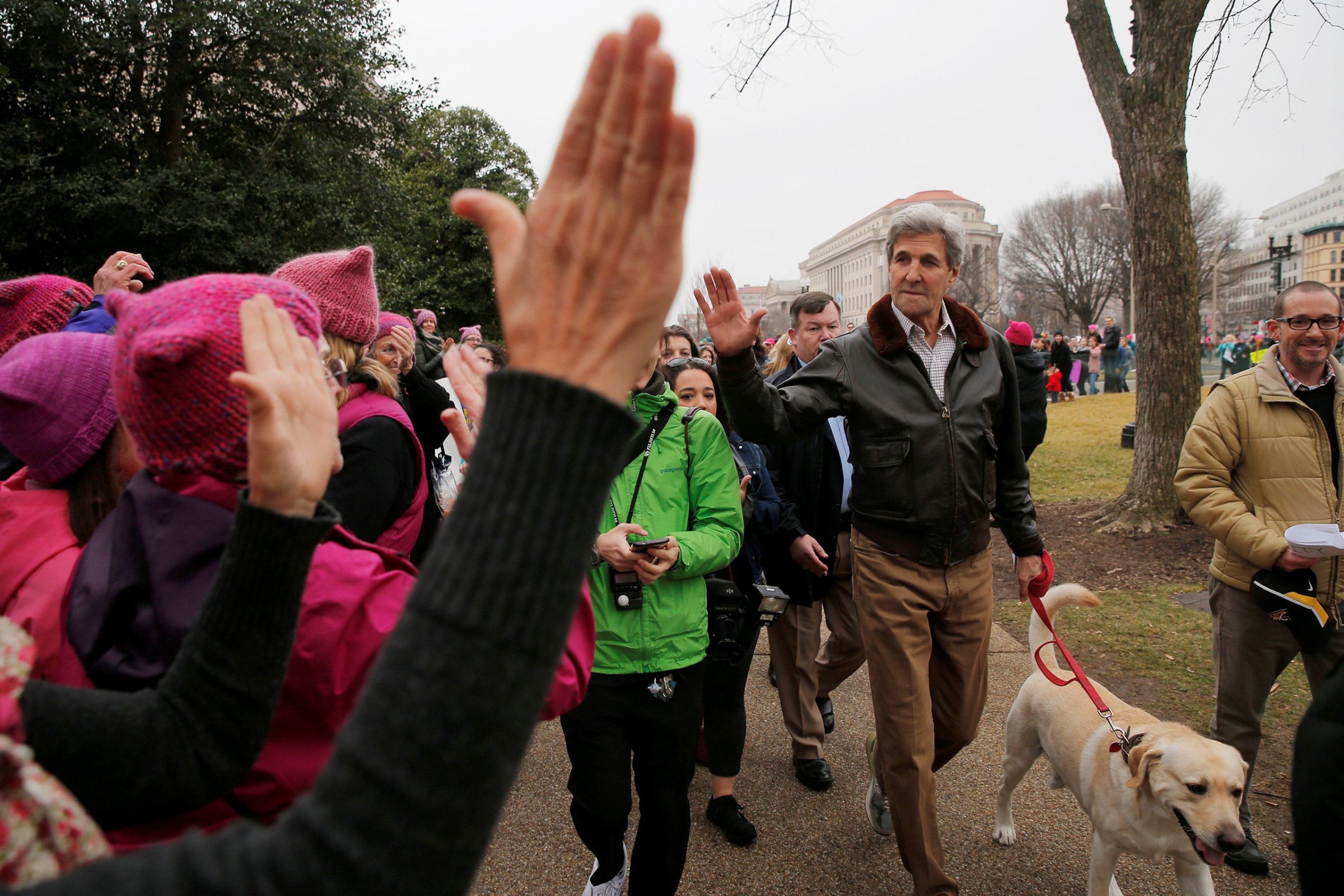 Former U.S. Secretary of State John Kerry walks his dog to join the Women's March on Washington, following the inauguration of U.S. President Donald Trump, on Jan. 21, 2017.