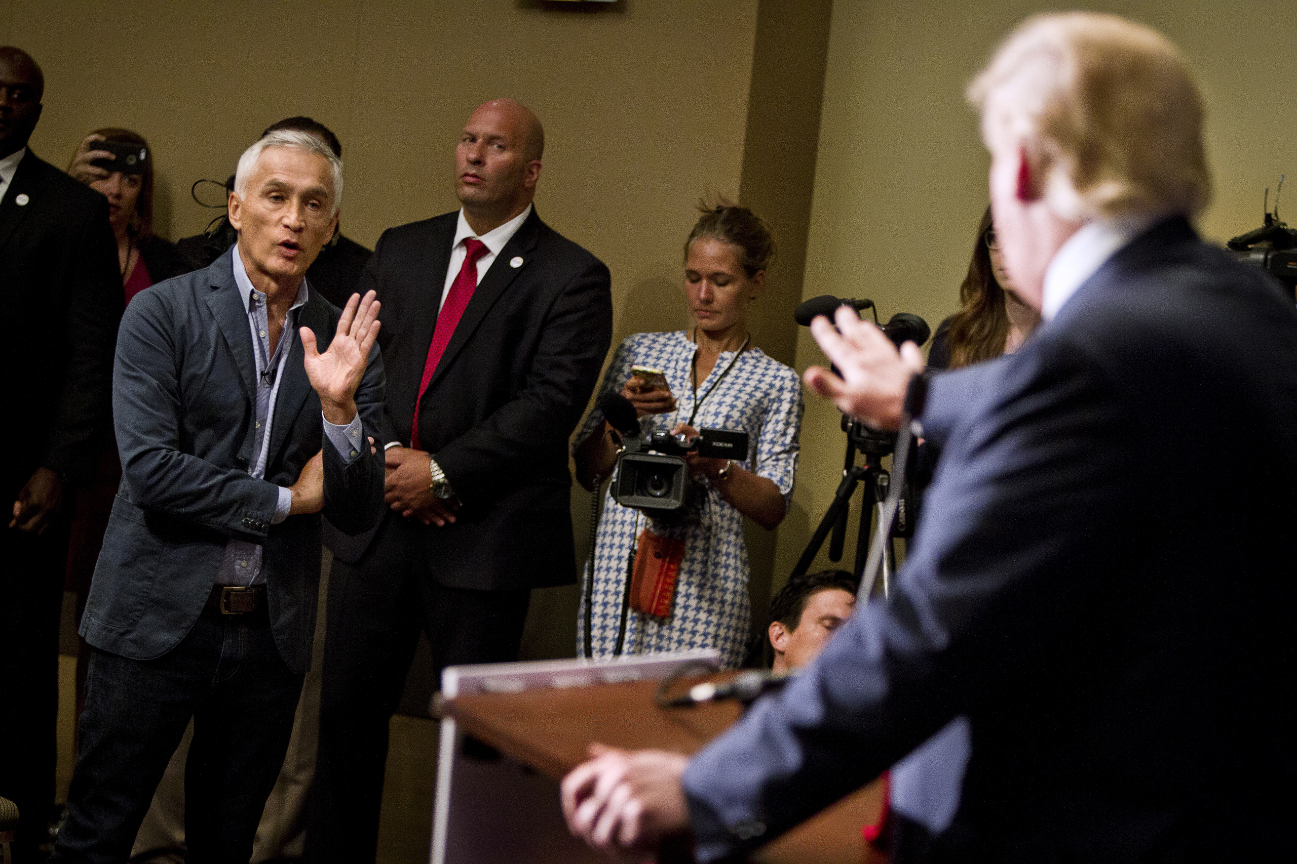 Jorge Ramos spars with then-Presidential candidate Donald Trump before his "Make America Great Again Rally" at the Grand River Center in Dubuque, Iowa, on Aug. 25, 2015. (Ben Brewer—Reuters&mdash;REUTERS)