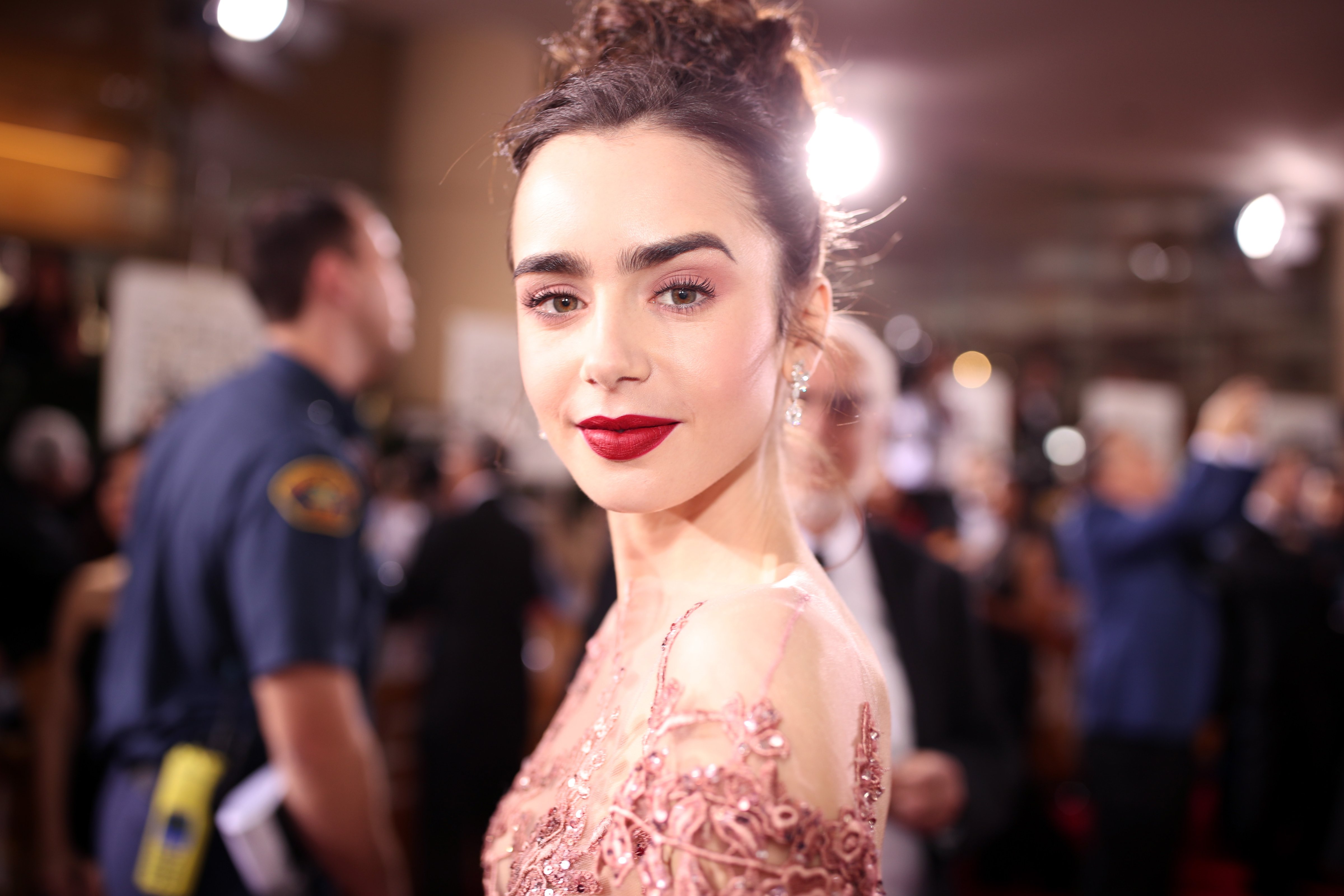 BEVERLY HILLS, CA - JANUARY 08:  74th ANNUAL GOLDEN GLOBE AWARDS -- Pictured:  Actress Lily Collins arrives to the 74th Annual Golden Globe Awards held at the Beverly Hilton Hotel on January 8, 2017.  (Photo by Christopher Polk/NBC/NBCU Photo Bank via Getty Images) (Christopher Polk/NBC—NBCU Photo Bank via Getty Images via Getty Images)