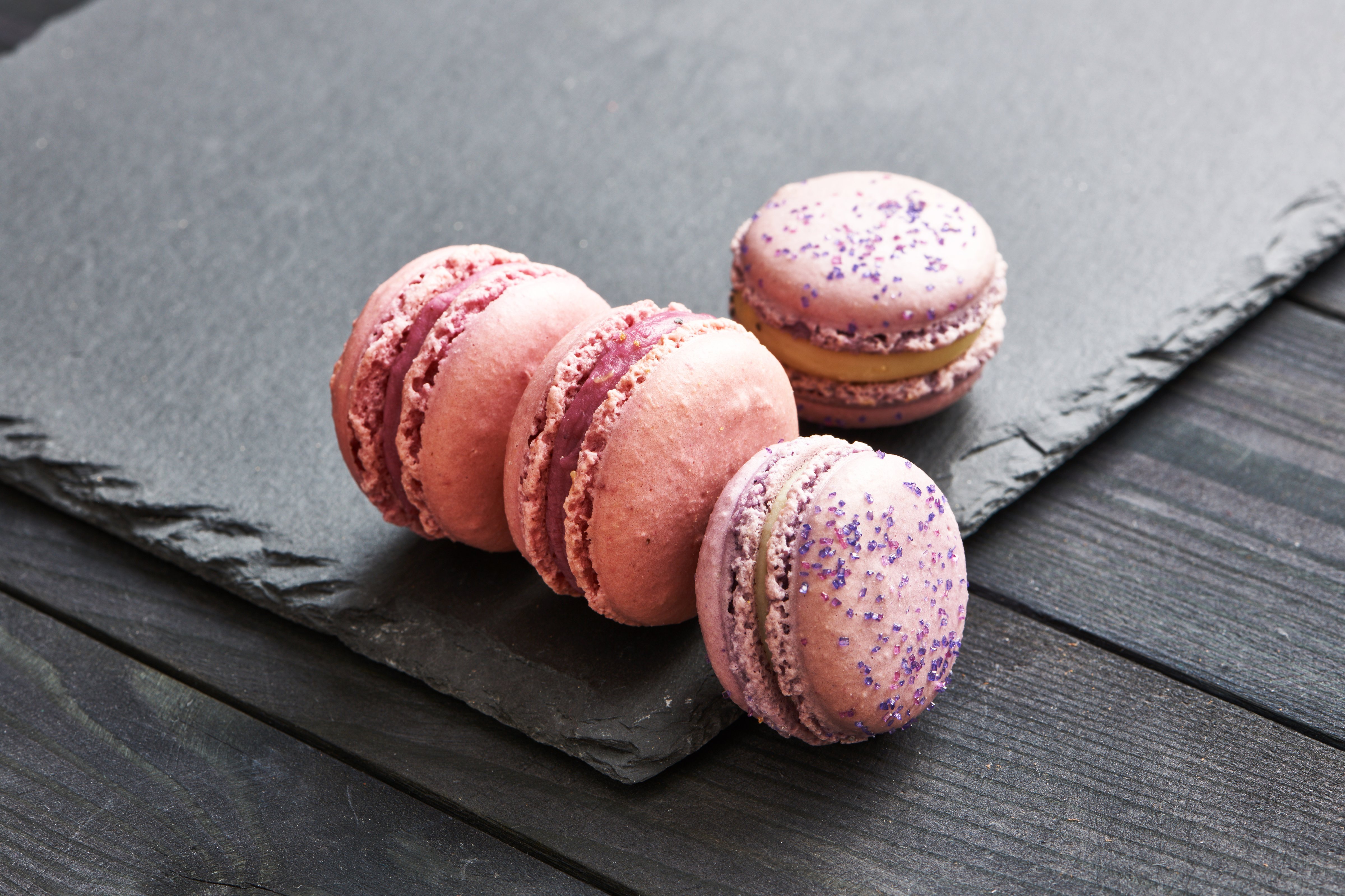 French delicious dessert macaroons on table (haveseen—Getty Images/iStockphoto)