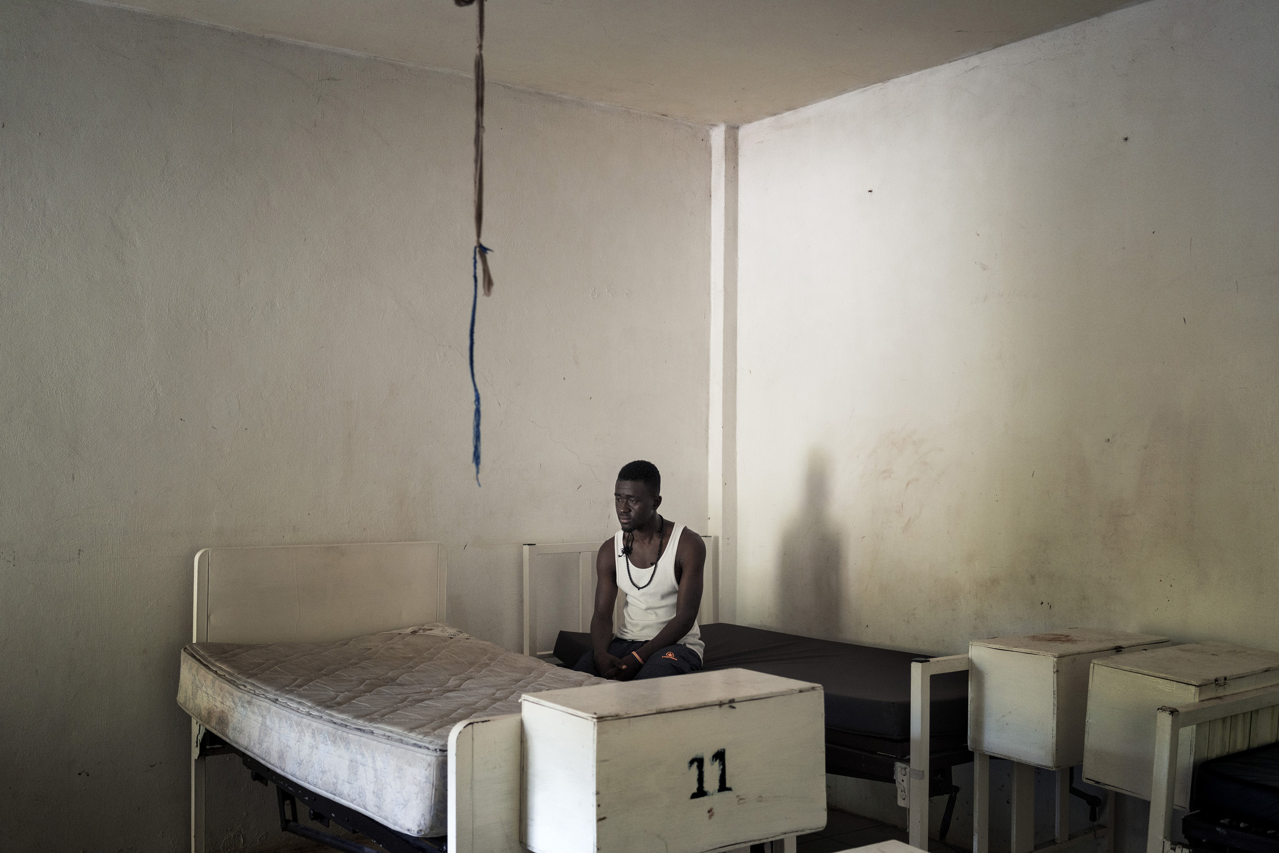 An illegal immigrant from Congo in the Tapachula migrant's home rests after a long journey by land from Brazil. He is preparing to take the bus for a three-day trip that will take him to Tijuana. Tapachula, Chiapas, Mexico. Sept. 26, 2016.