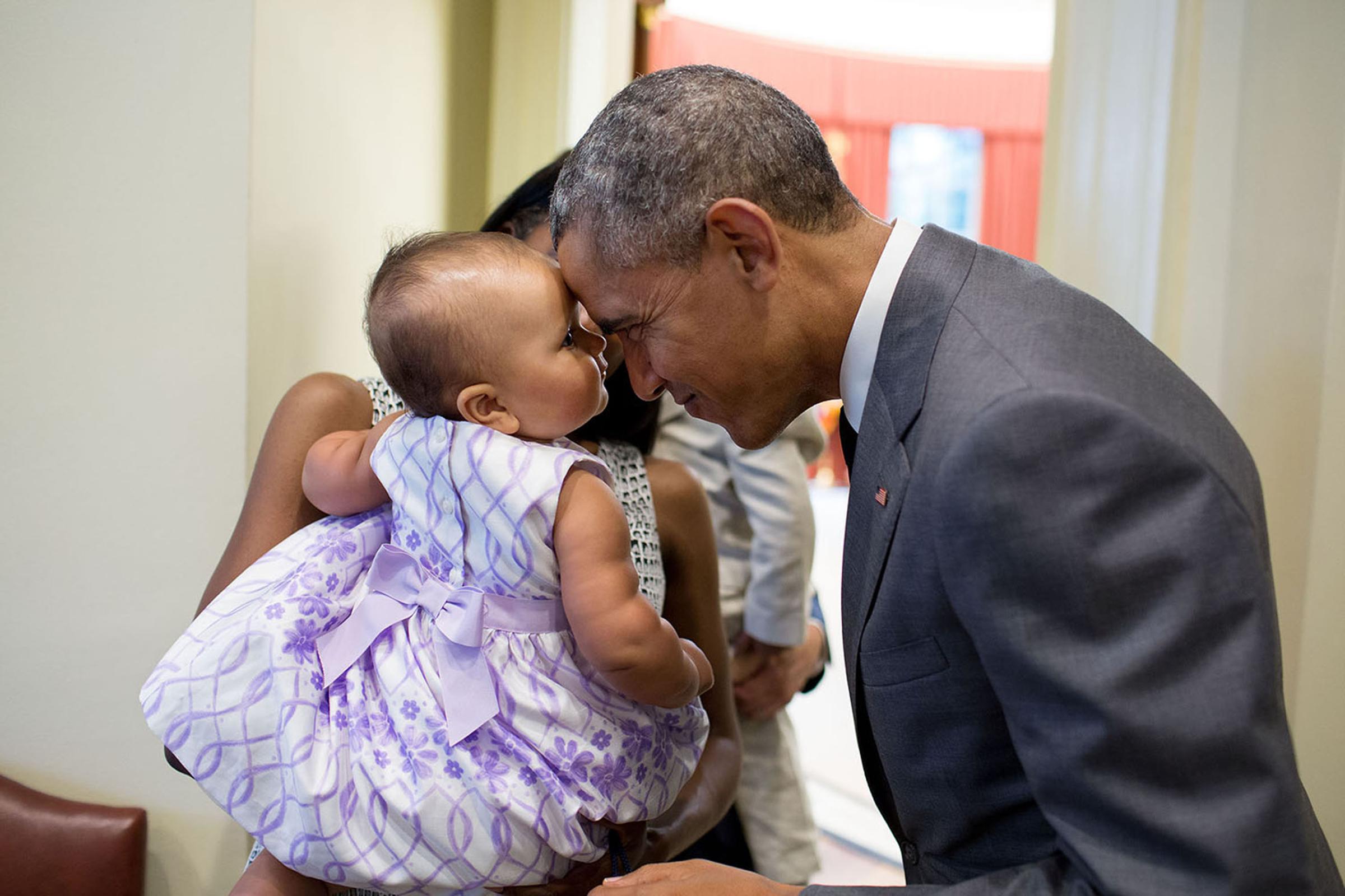 July 17, 2015"The President greets nine-month-old Josephine Gronniger, whose father, Tim Gronniger, brought his family by the Oval Office for a family photo." (Official White House Photo by Pete Souza)This official White House photograph is being made available only for publication by news organizations and/or for personal use printing by the subject(s) of the photograph. The photograph may not be manipulated in any way and may not be used in commercial or political materials, advertisements, emails, products, promotions that in any way suggests approval or endorsement of the President, the First Family, or the White House.
