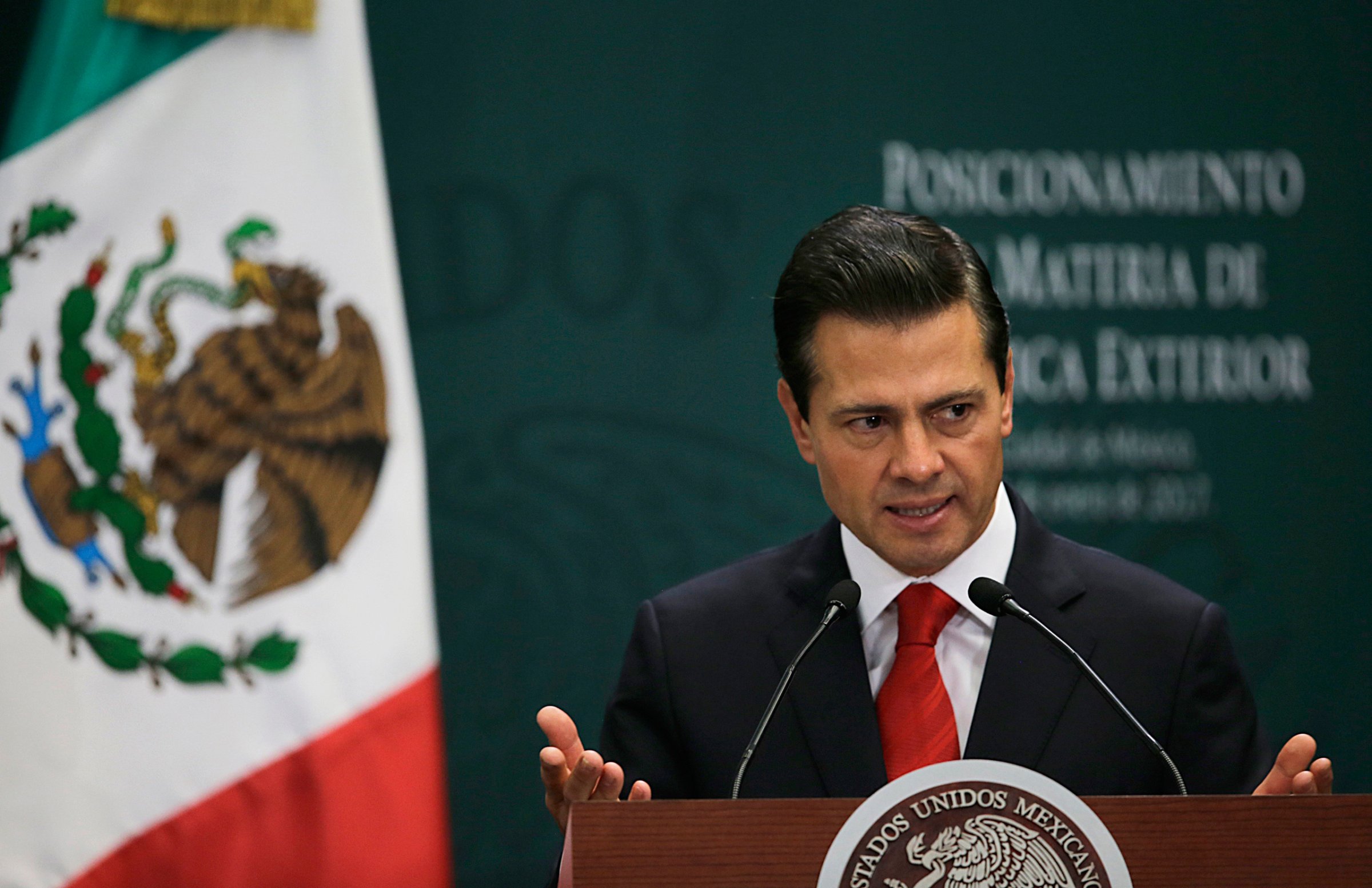 Mexico's President Enrique Pena Nieto speaks during a press conference at Los Pinos presidential residence in Mexico City, Monday, Jan. 23, 2017. Pena Nieto said Monday that Mexico's attitude towards the Donald Trump administration should not be aggressive or biased, but one of dialogue. (AP Photo/Marco Ugarte)