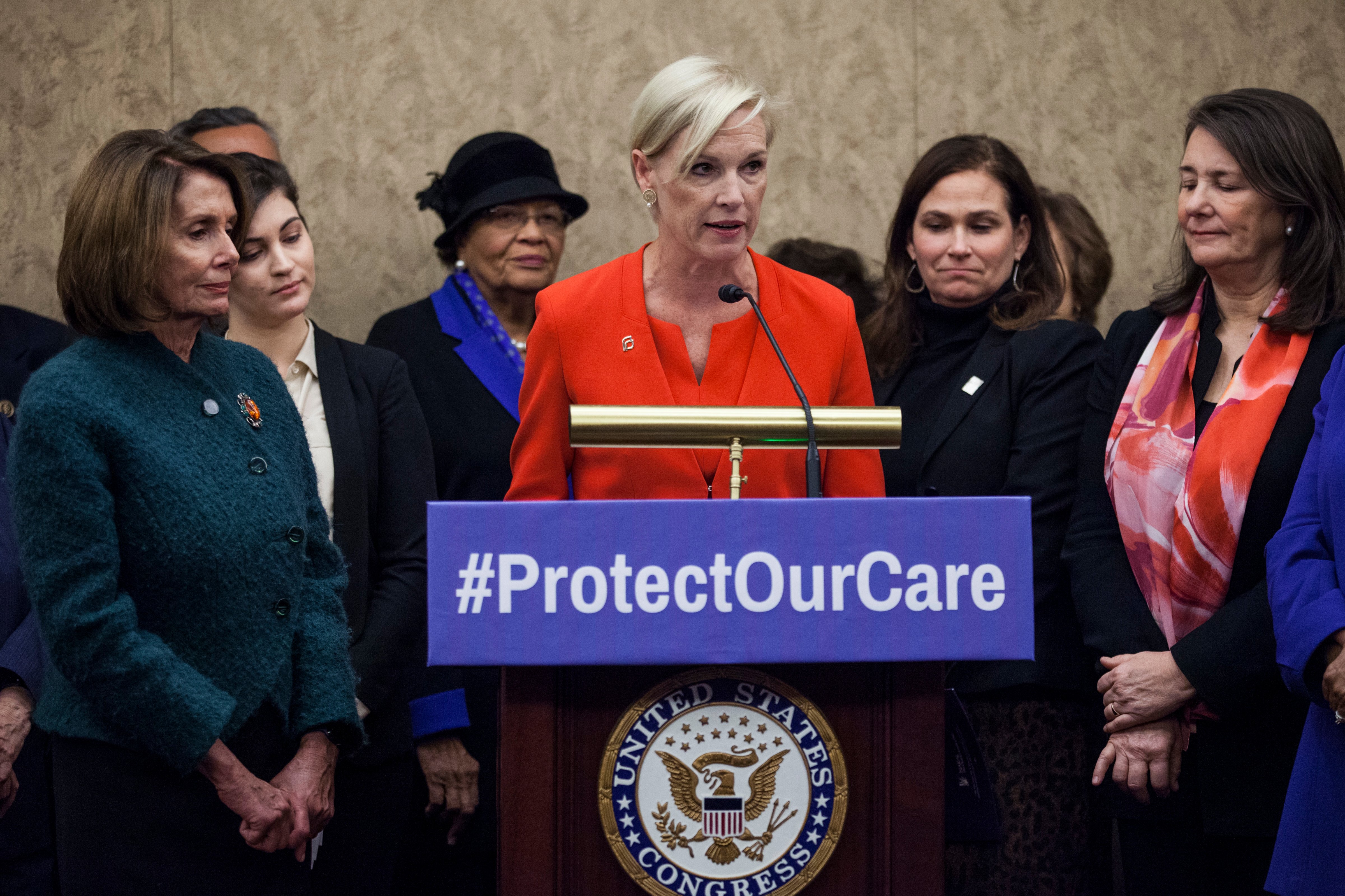 Planned Parenthood president Cecile Richards, joined by House Minority Leader Nancy Pelosi of Calif., left, and Rep. Diana DeGette, D-Colo., right, and others, speaks during a news conference discussing women's health care, Jan. 5, 2017, on Capitol Hill in Washington. (Zach Gibson—AP)