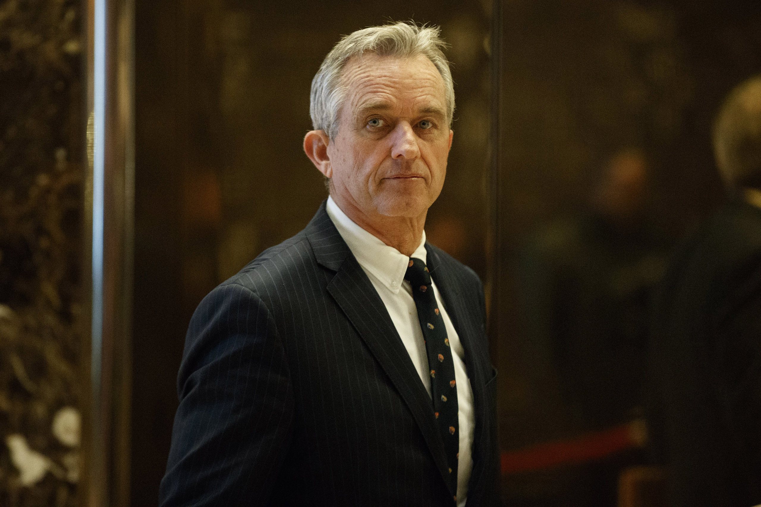 Robert F. Kennedy Jr. arrives in the lobby of Trump Tower for a meeting with President-elect Donald Trump, in New York, on Jan. 10, 2017. (Evan Vucci—AP)
