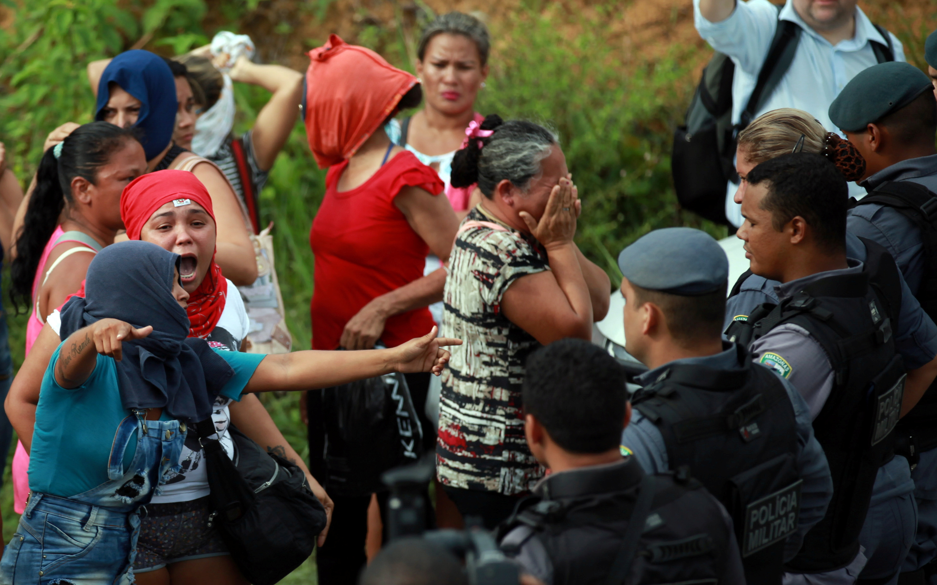 Relatives of prisoners react at a checkpoint close to the prison where around 60 people were killed in a prison riot in  Manaus, Brazil on Jan. 2, 2017. (Michael Dantas—Reuters)