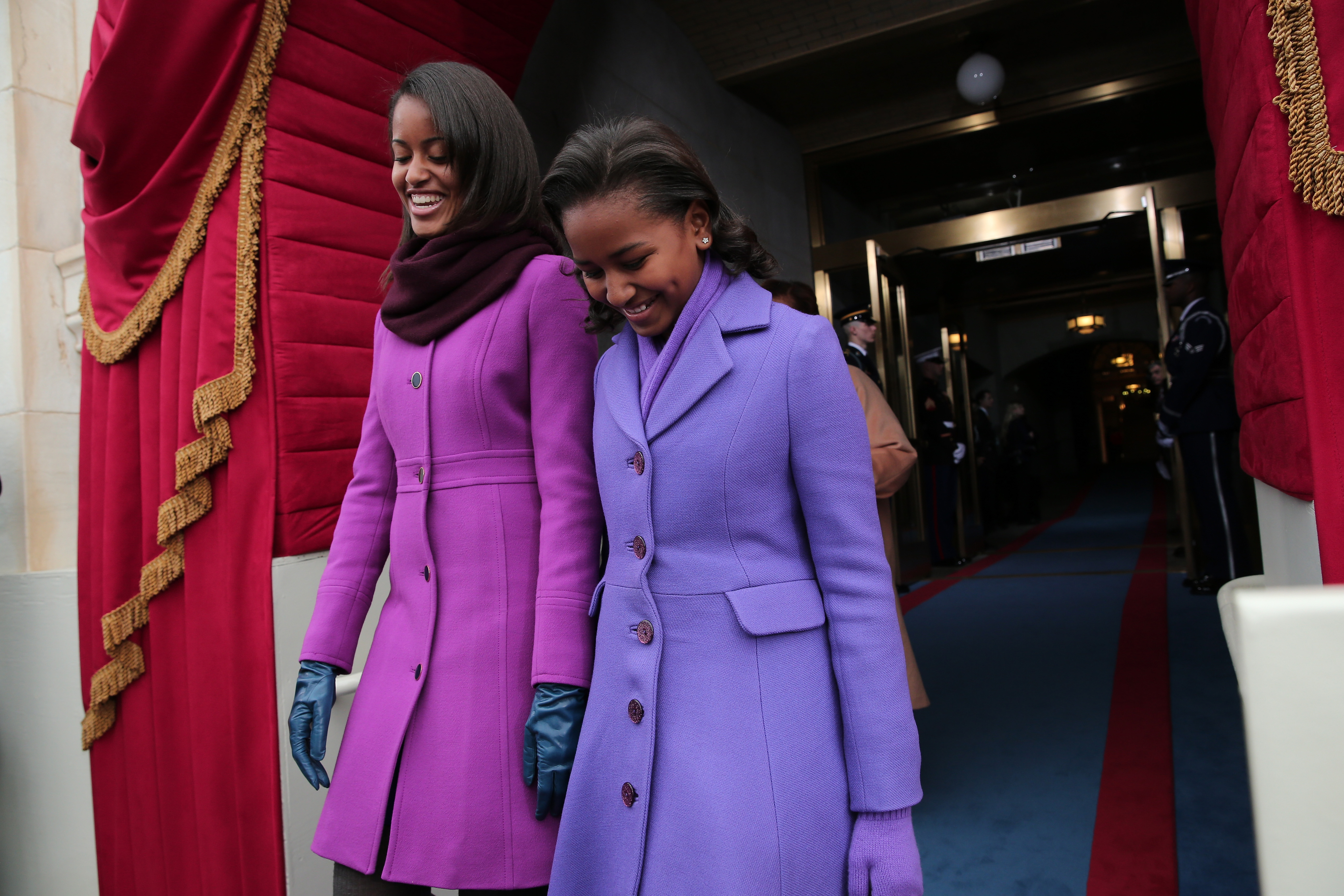 Malia and Sasha arrive during the presidential inauguration on the West Front of the U.S. Capitol in Washington, DC, on Jan. 21, 2013.