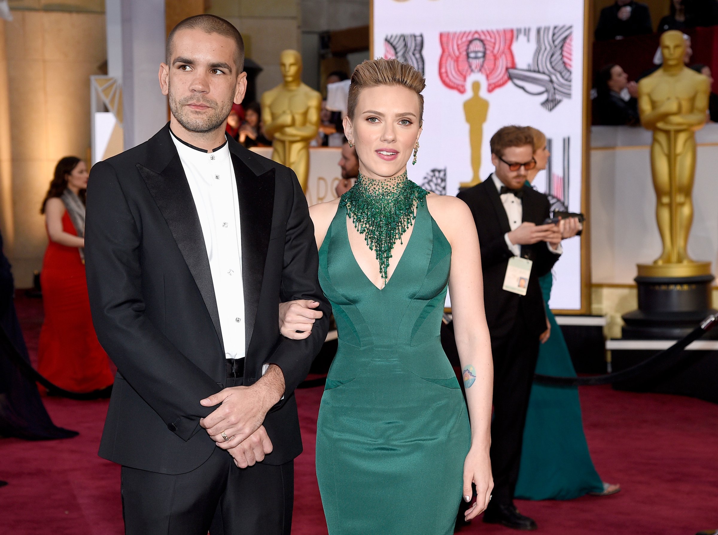 Actress Scarlett Johansson (R) and Romain Dauriac attend the 87th Annual Academy Awards at Hollywood & Highland Center on February 22, 2015 in Hollywood, California.