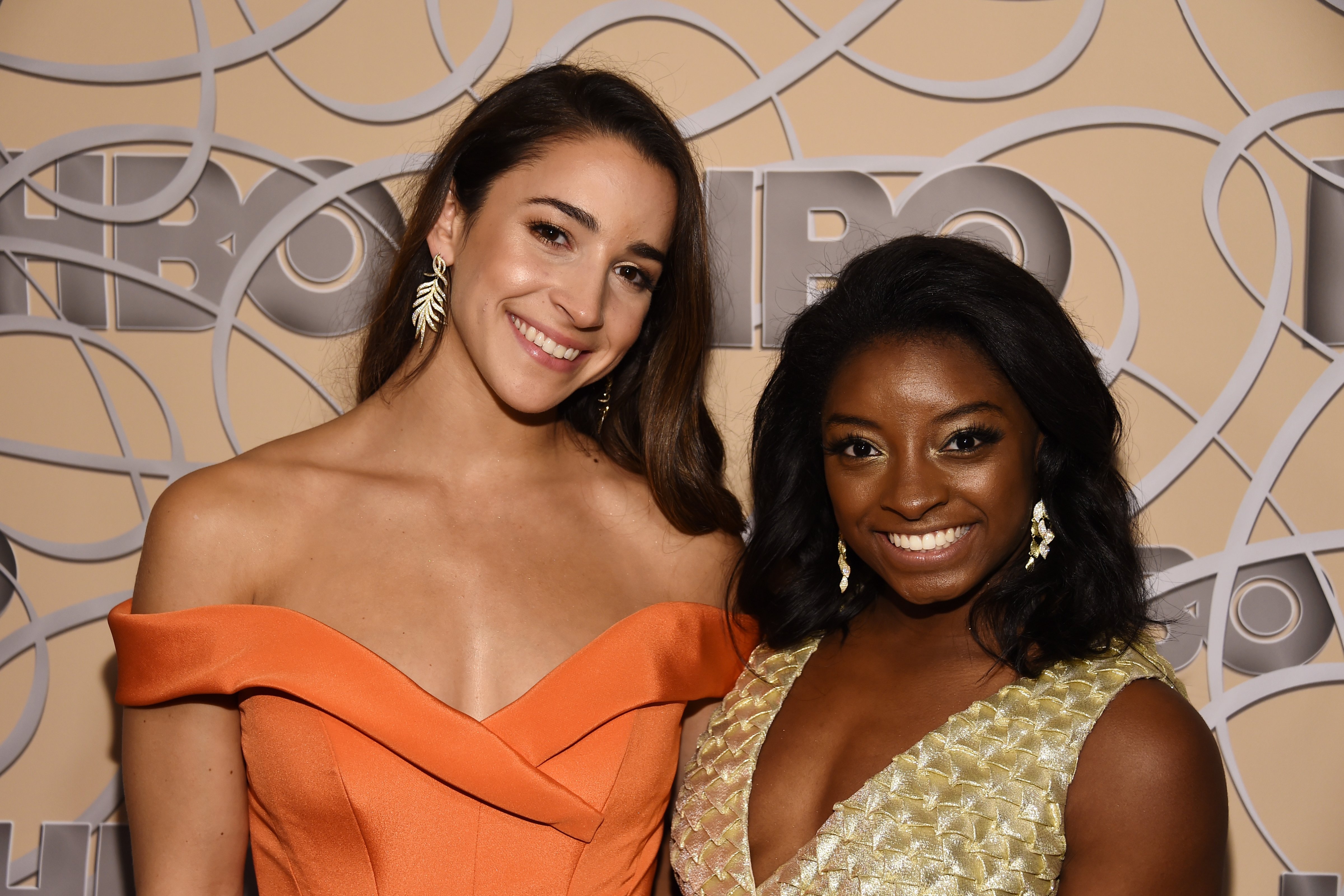 LOS ANGELES, CA - JANUARY 08:  Olympic gymnasts Aly Raisman (L) and Simone Biles arrive at HBO's Official Golden Globe Awards After Party at Circa 55 Restaurant on January 8, 2017 in Los Angeles, California.  (Photo by Amanda Edwards/WireImage) (Amanda Edwards&mdash;WireImage/Getty Images)