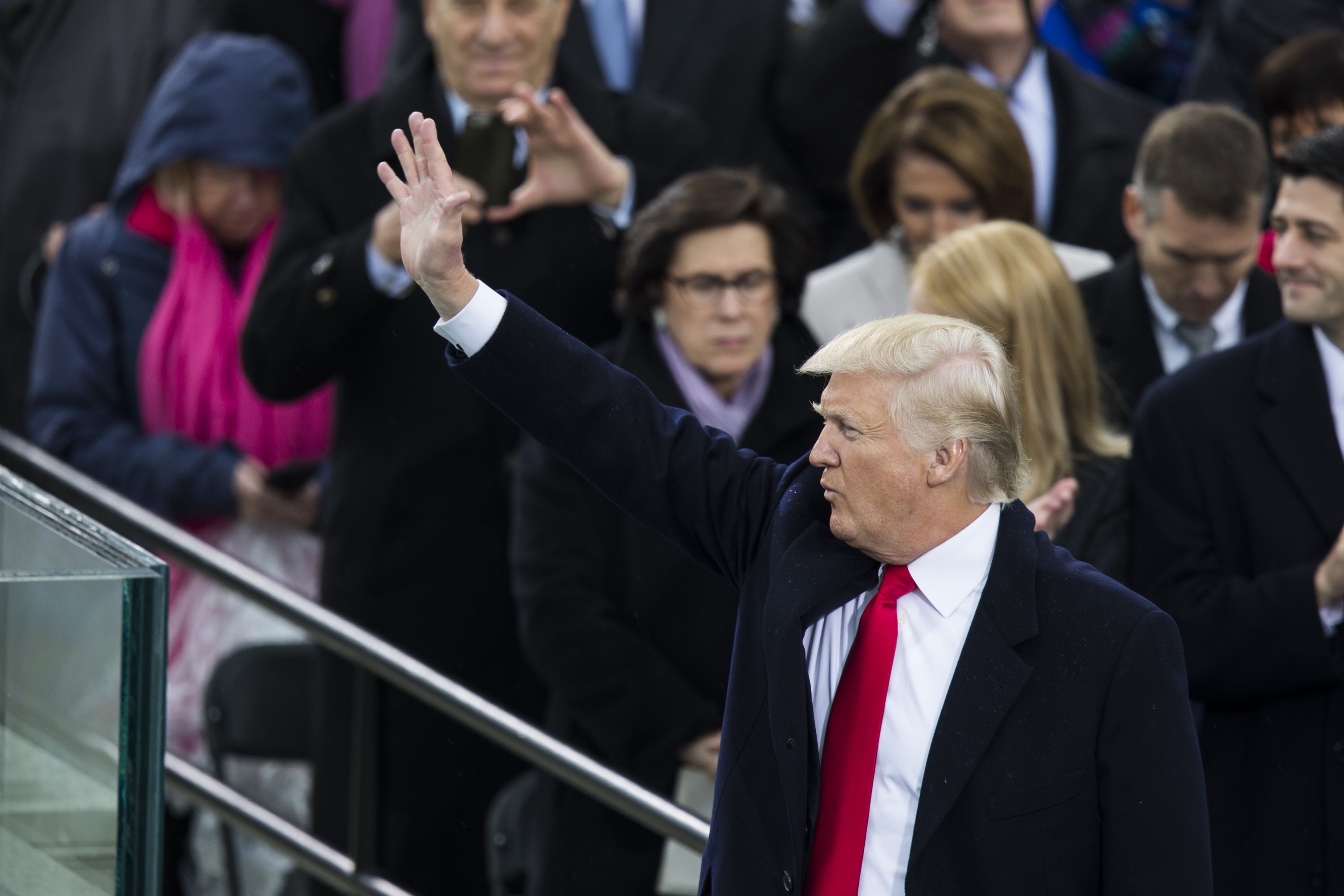 WASHINGTON, USA - JANUARY 20: President Donald Trump waves to the crowds during the 58th U.S. Presidential Inauguration after he was sworn in as the 45th President of the United States of America in Washington, USA on January 20, 2017. (Anadolu Agency—Getty Images)