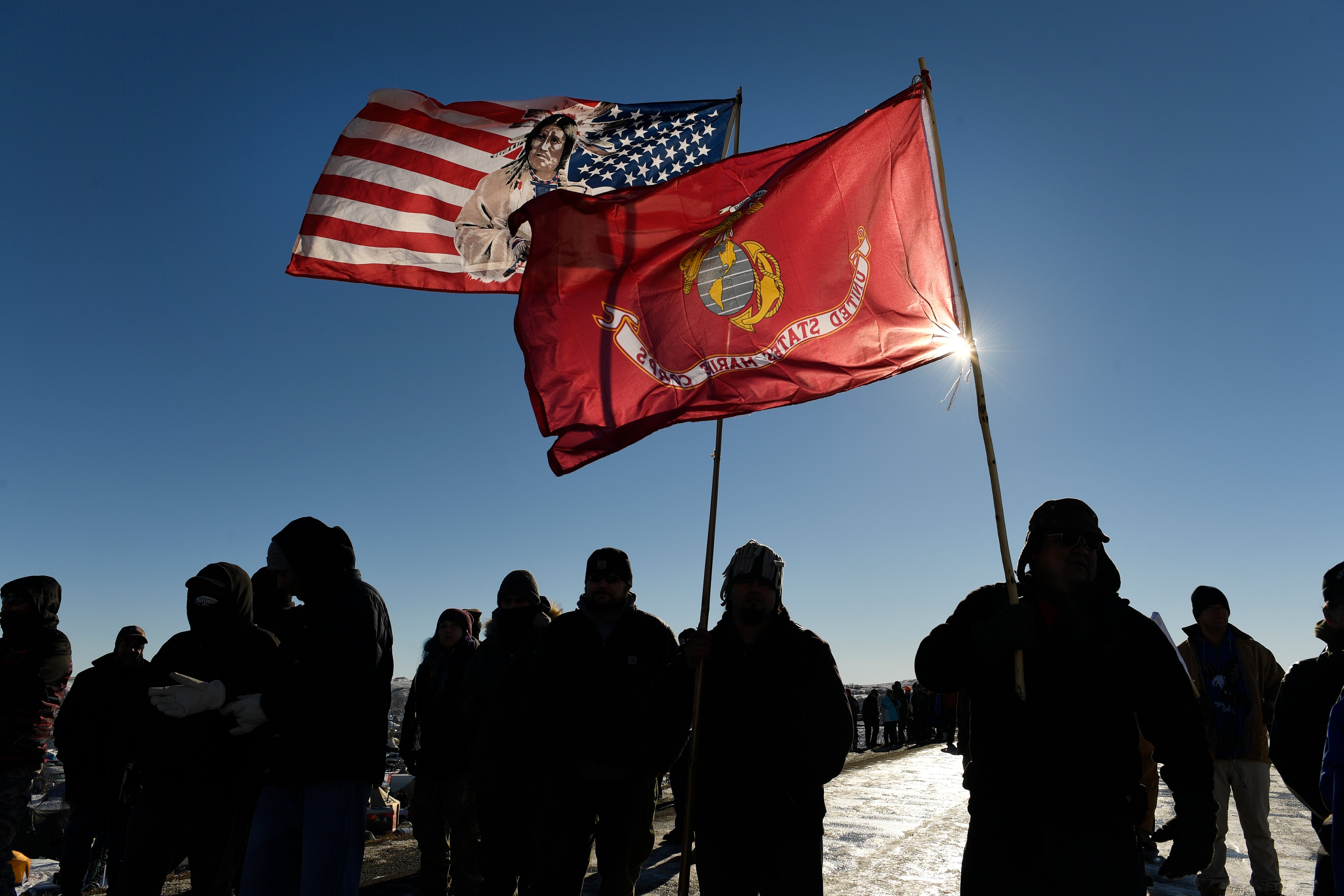 USveterans and native americans hold flags in solidarity at the Standing Rock Sioux Reservation on Dec. 4, 2016 outside Cannon Ball, North Dakota. (Helen H. Richardson—Denver Post/Getty Images)