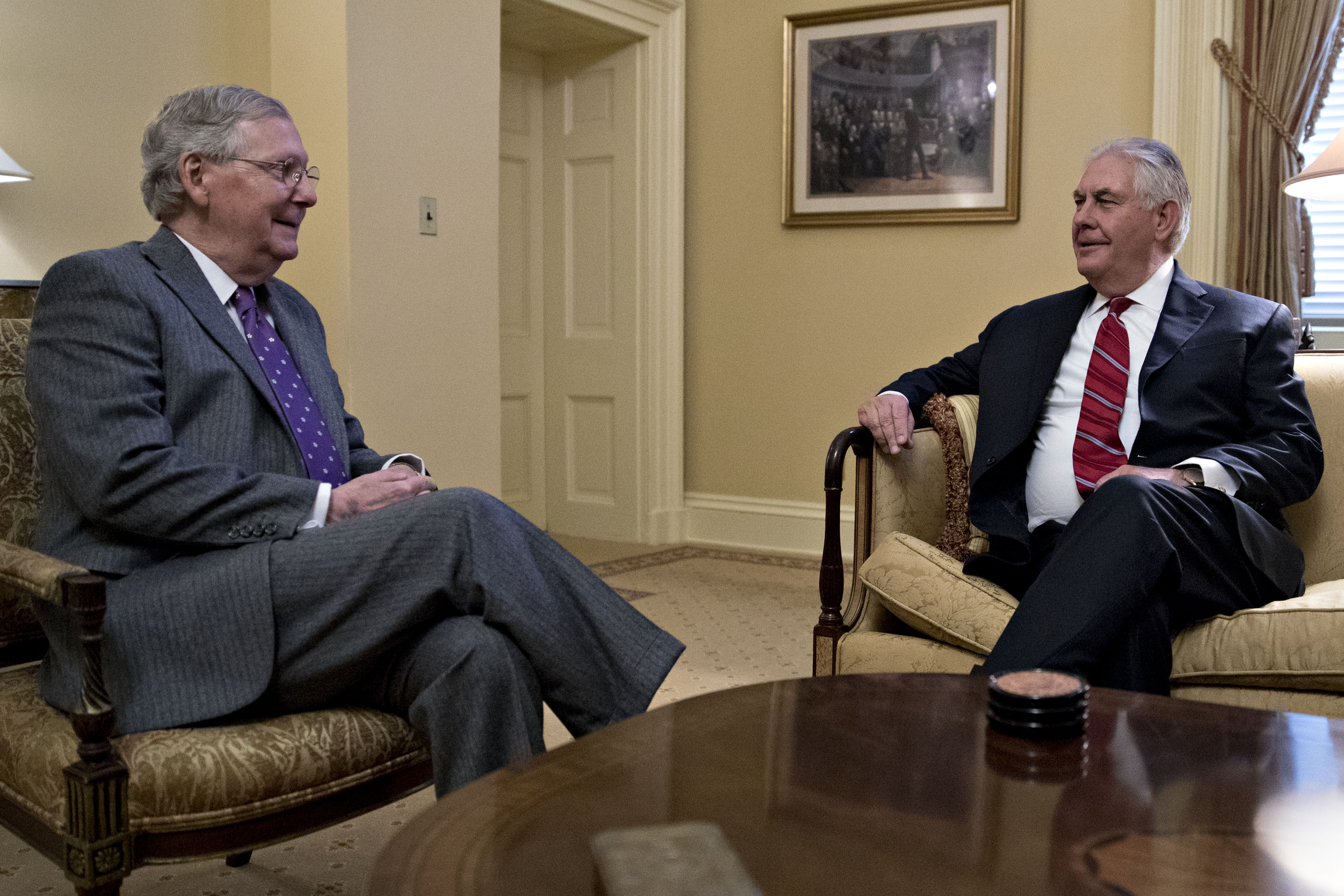 Rex Tillerson, former chief executive officer of Exxon Mobile Corp. and U.S. Secretary of State nominee for President-elect Donald Trump, right, talks to Senate Majority Leader Mitch McConnell, a Republican from Kentucky, during a meeting on Capitol Hill in Washington, D.C., on Jan. 4, 2017. (Andrew Harrer—Bloomberg/Getty Images)