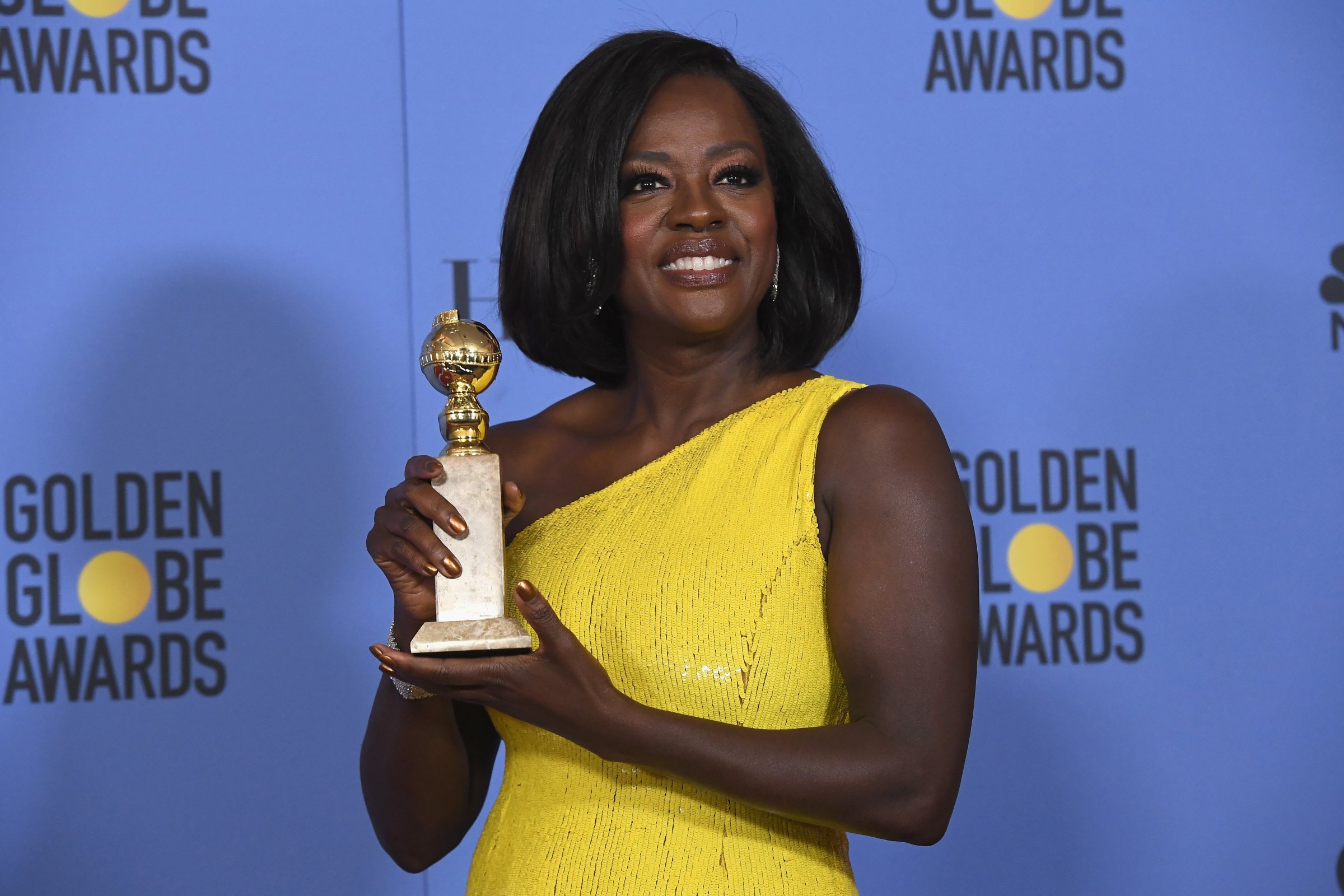 74th ANNUAL GOLDEN GLOBE AWARDS -- Pictured: (l-r) Actress Viola Davis, winner of the Best Performance by an Actress in a Supporting Role in Any Motion Picture for 'Fences', posesin the press room at the 74th Annual Golden Globe Awards held at the Beverly Hilton Hotel on January 8, 2017.