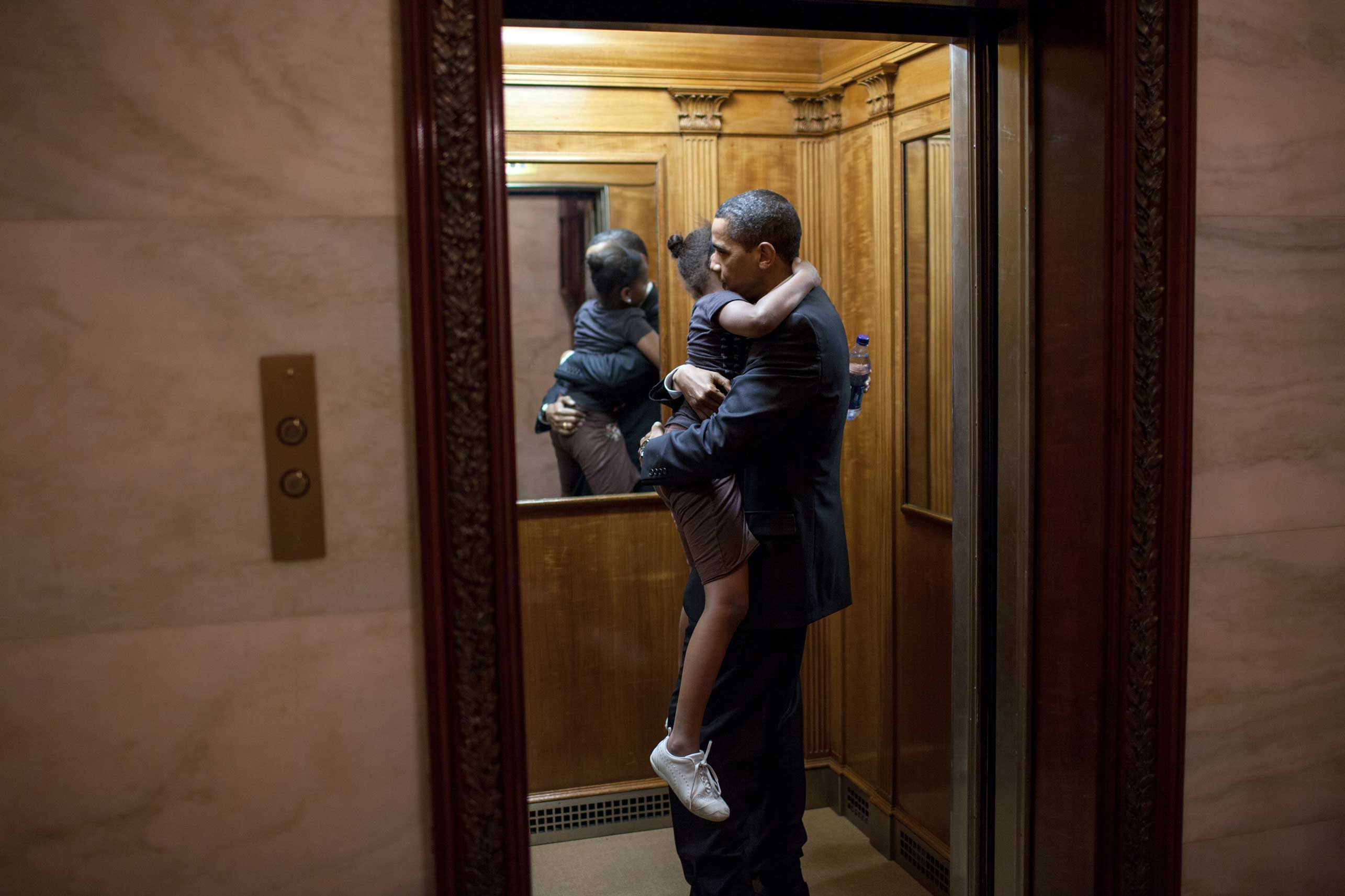President Barack Obama was leaving the State Floor after an event and found Sasha in the elevator ready to head upstairs to the private residence. He decided to ride upstairs with her before returning to the Oval Office, on May 19, 2009.