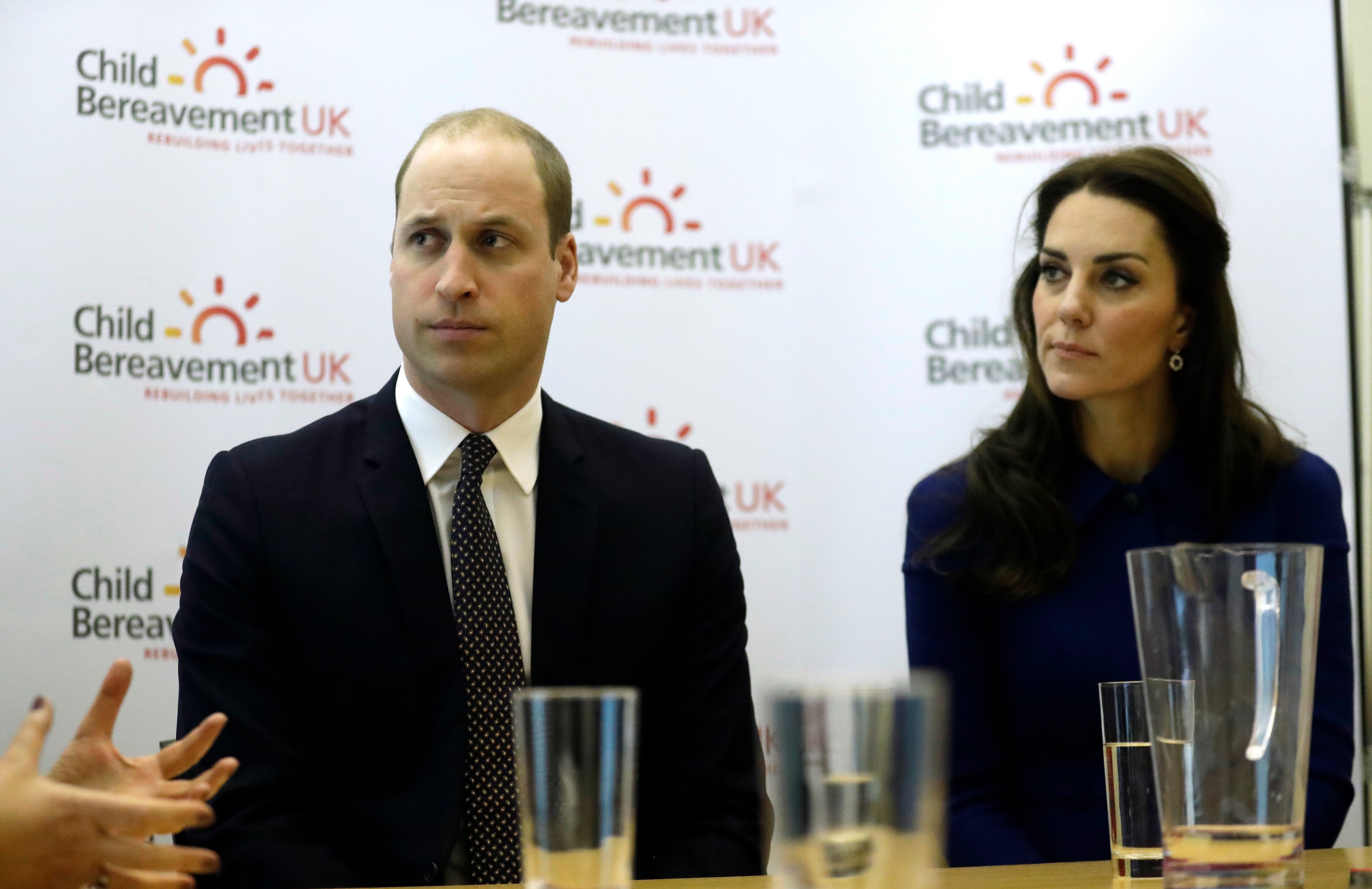 LONDON, ENGLAND - JANUARY 11:  Catherine, Duchess of Cambridge and Prince William, Duke of Cambridge listen during a meeting with professionals at the Child Bereavement UK Centre in Stratford. (WPA Pool&mdash;Getty Images)
