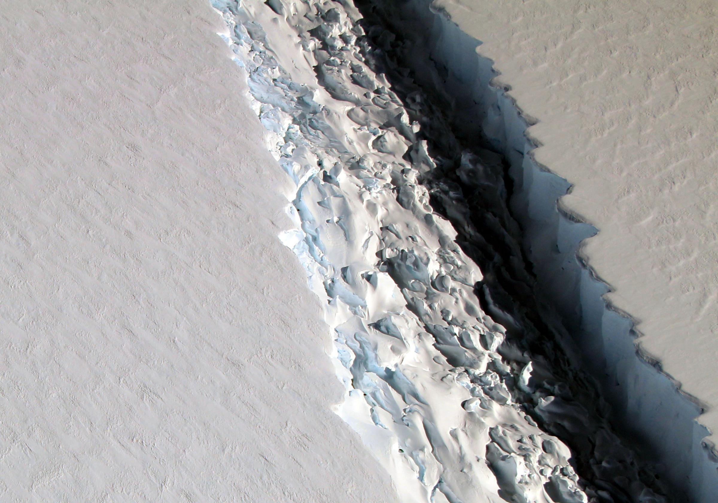 Scientists  photographed  a massive rift in the Antarctic Peninsula's Larsen C ice shelf,  Nov. 10, 2016, as part of NASA's IceBridge mission, a series of research flights  to study polar ice.