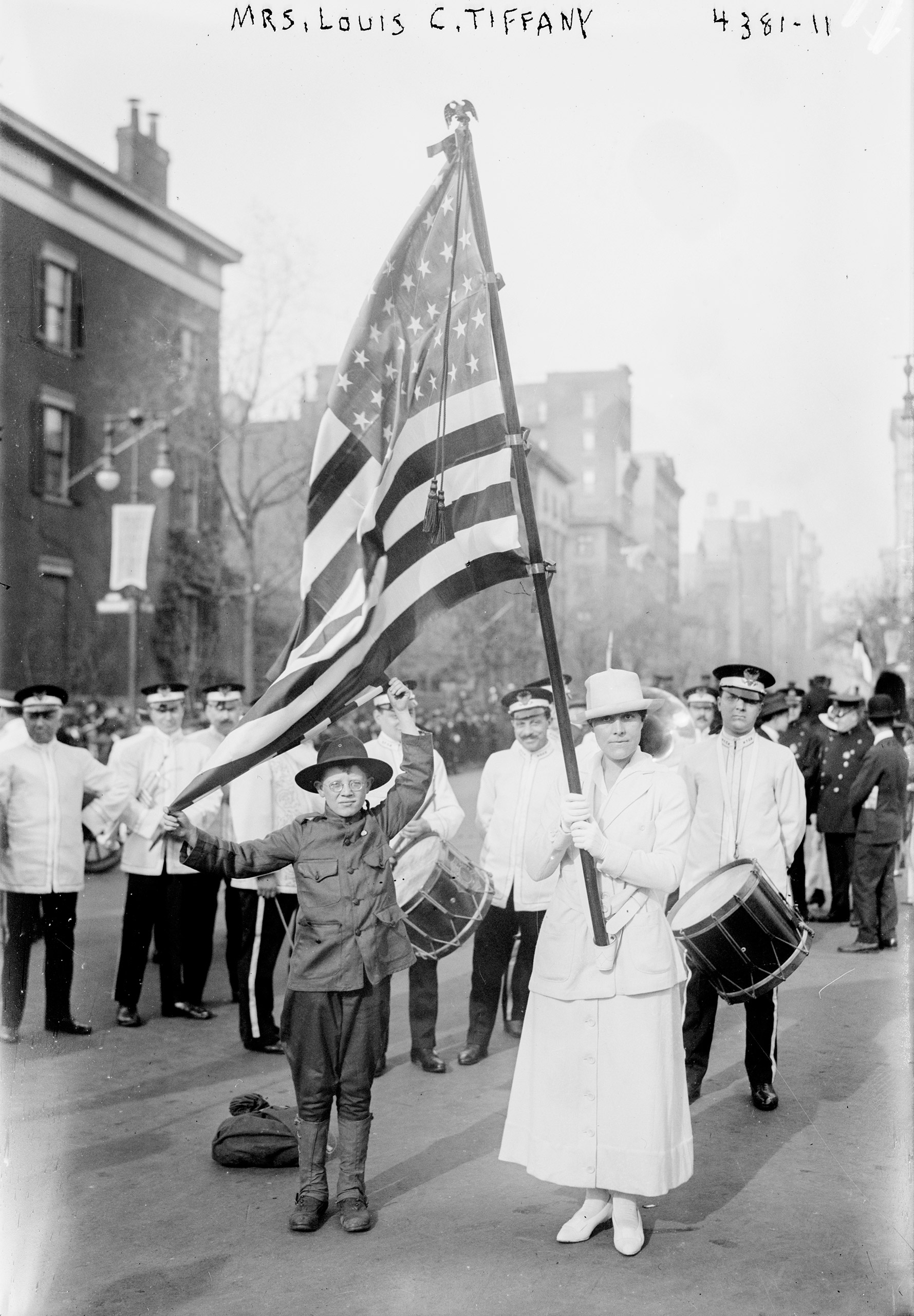 Mrs. Charles Lewis Tiffany, née Katrina Brandes Ely, carrying a flag in suffrage parade, New York City, Oct. 27, 1917.
