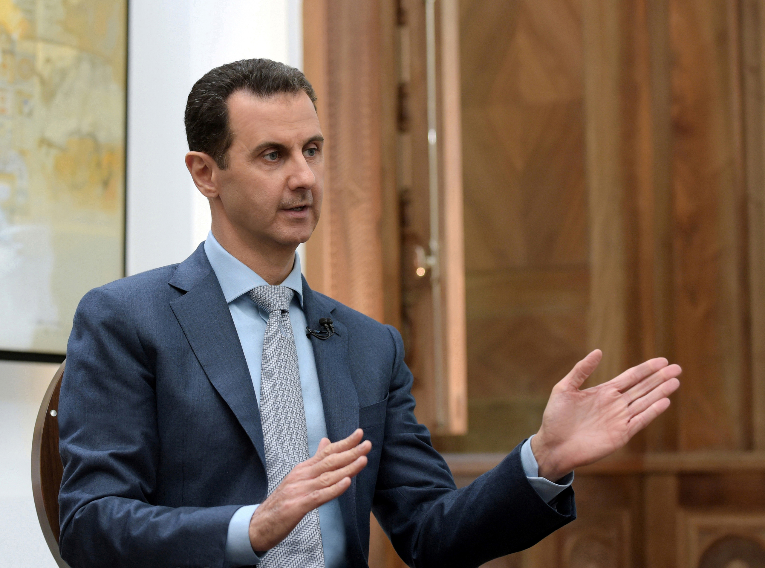 Syria's President Bashar al-Assad speaks during an interview with Yahoo News in this handout picture provided by SANA on Feb. 10, 2017. (Agencja Gazeta/Reuters)