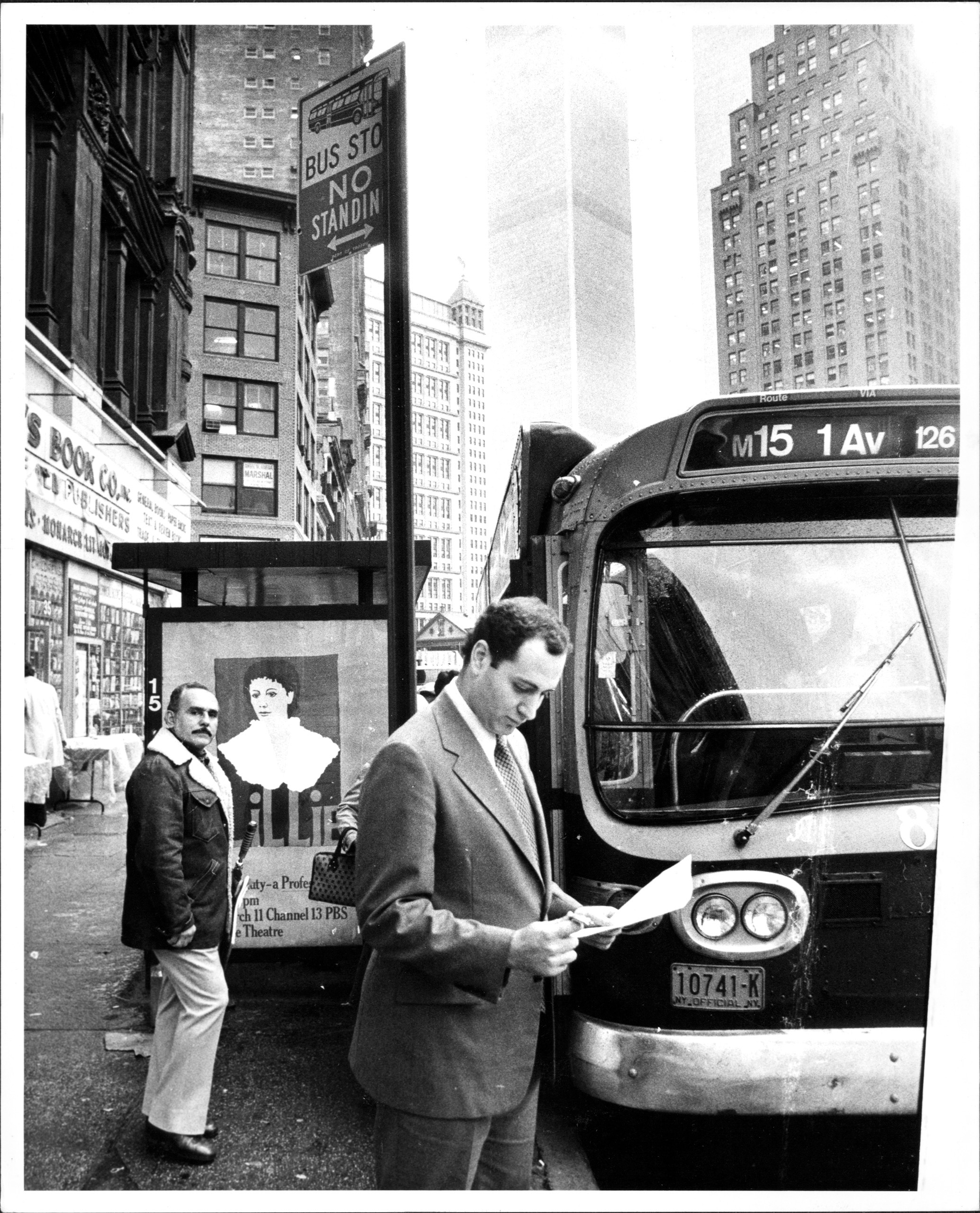 Assemblyman Schumer as the chairman of the Assembly's Committee on Legislative Oversight and Investigation as he monitors the schedule of the buses, April 16, 1979.