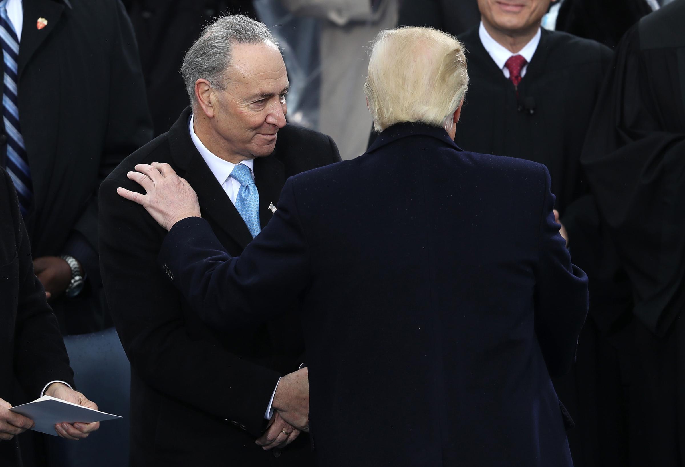 Sen. Chuck Schumer (D-NY) greets President Donald Trump on West Front of the U.S. Capitol on the day of the inauguration ceremony of Donald J. Trump, in Washington, D.C. Jan. 20, 2017.