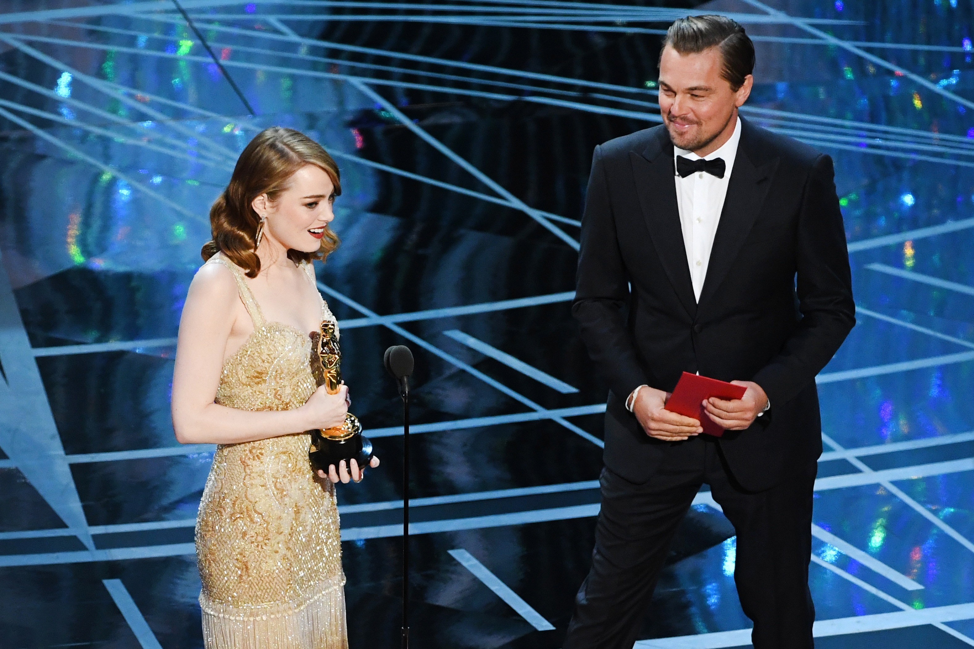 Emma Stone accepts Best Actress for <i>La La Land</i> from Leonardo DiCaprio during the 89th Annual Academy Awards, on Feb. 26, 2017 in Hollywood, Calif. (Kevin Winter—Getty Images)